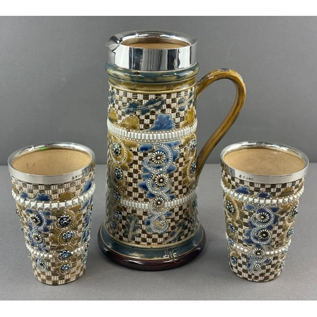 Ceramics: Doulton Lambeth- a silver mounted lemonade jug, Sh...