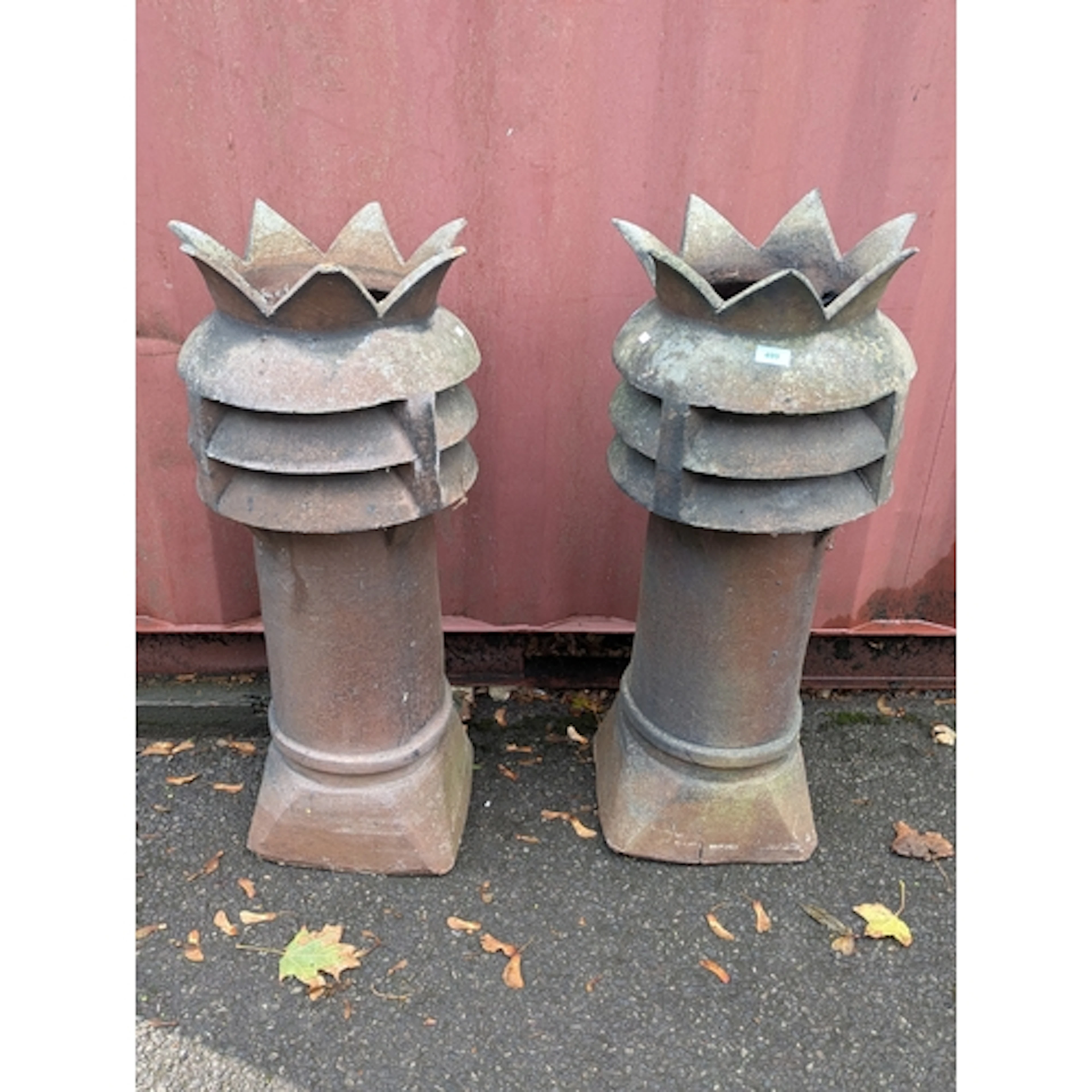 A pair of late 19th century terracotta 'King and Queen' chim...