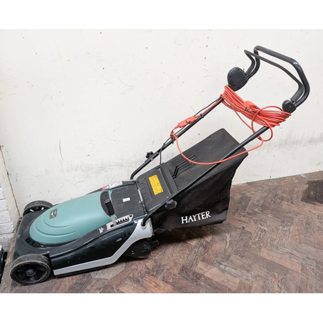 An electric Hayter lawn mower with roller and grass collecti...
