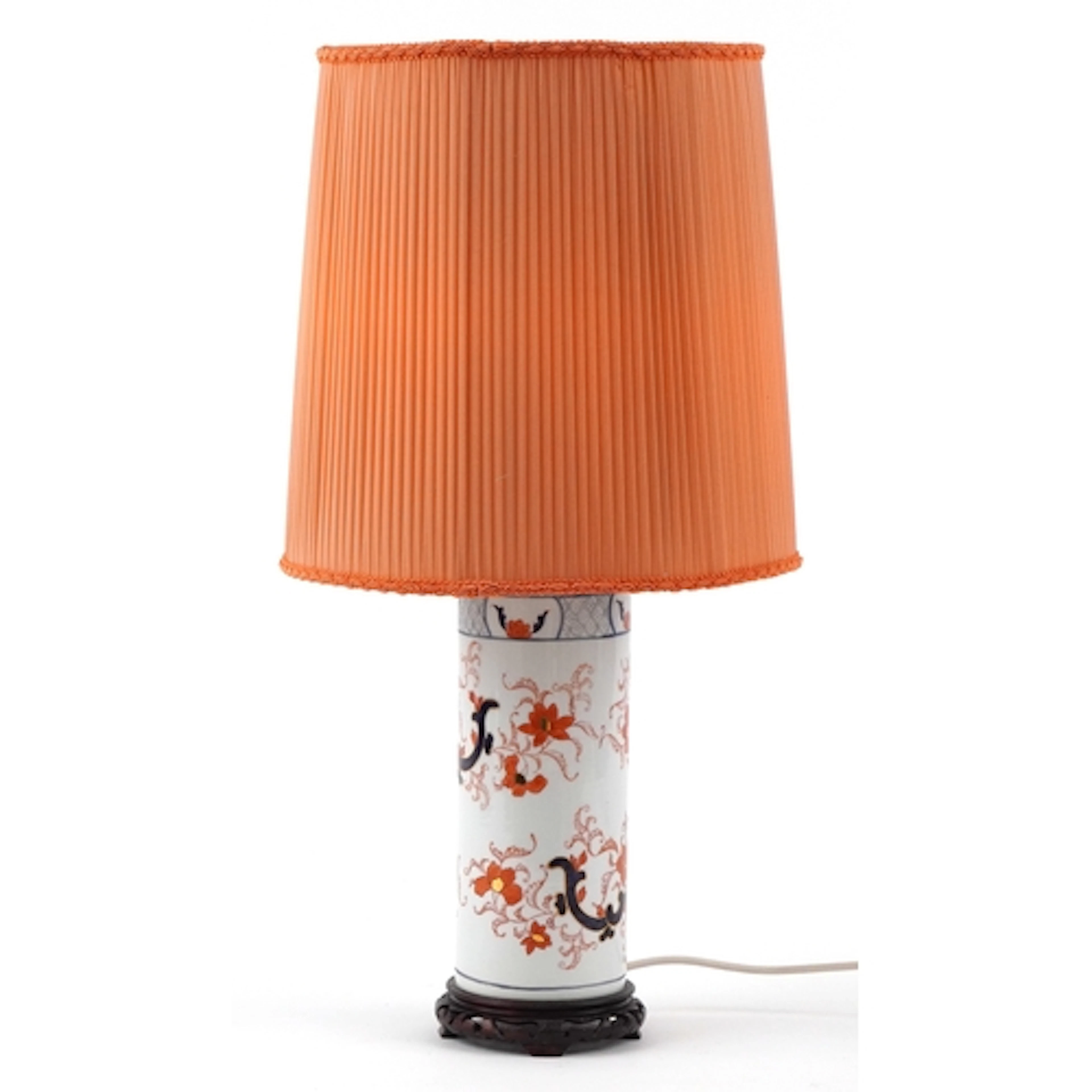 Japanese porcelain table lamp raised on a hardwood stand, wi...