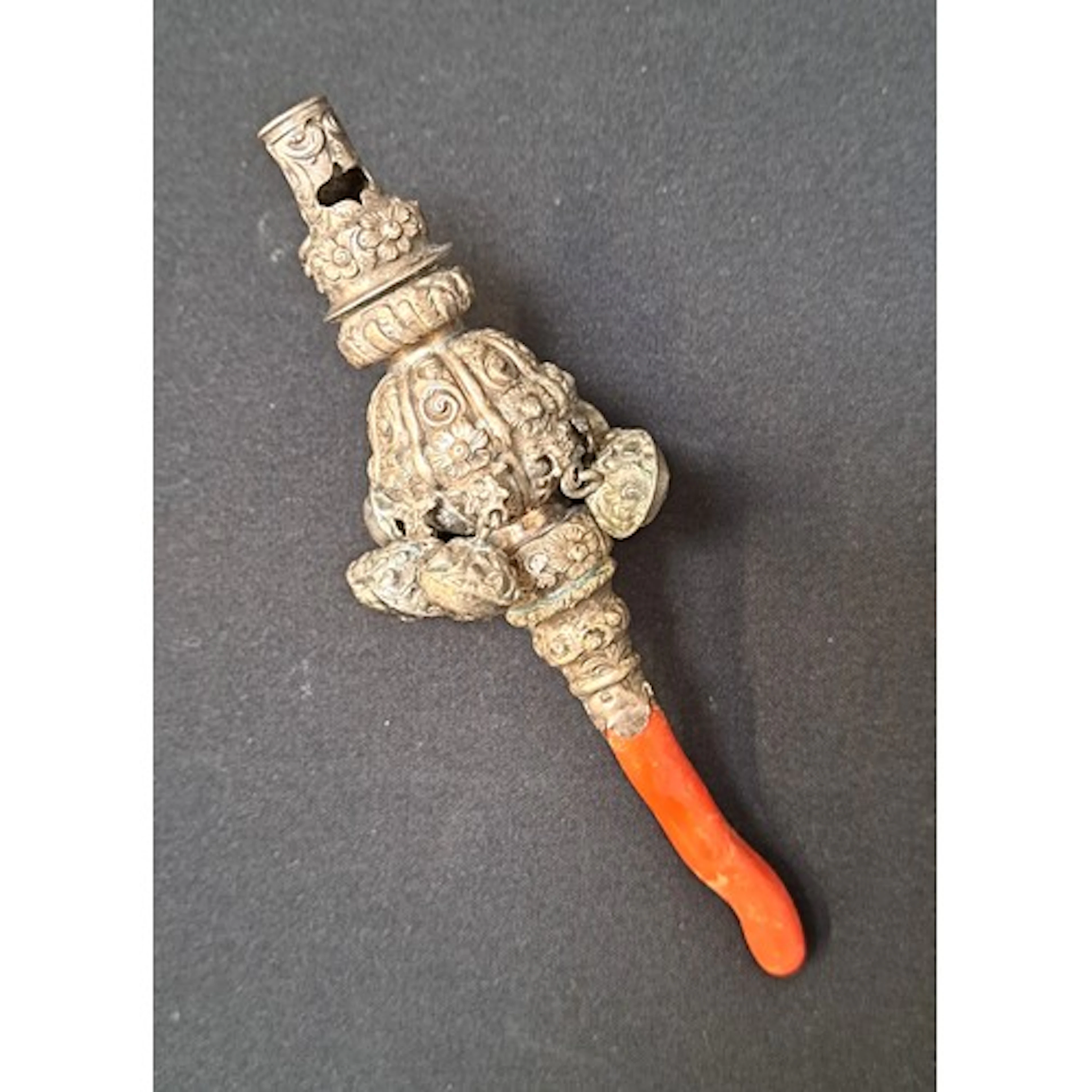 GEORGIAN SILVER RATTLE with scroll and floral decoration, ei...