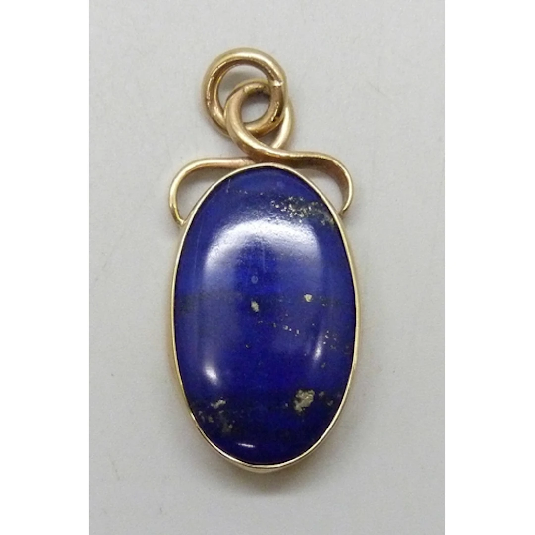 A 9ct gold framed lapis lazuli fob style necklace pendant, 1...