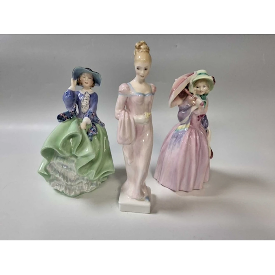 THREE PORCELAIN LADY FIGURINES BY ROYAL DOULTON comprising '...