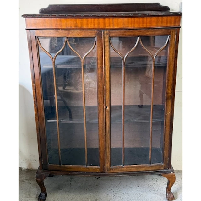 A Bow front mahogany display cabinet with astragal glazed do...