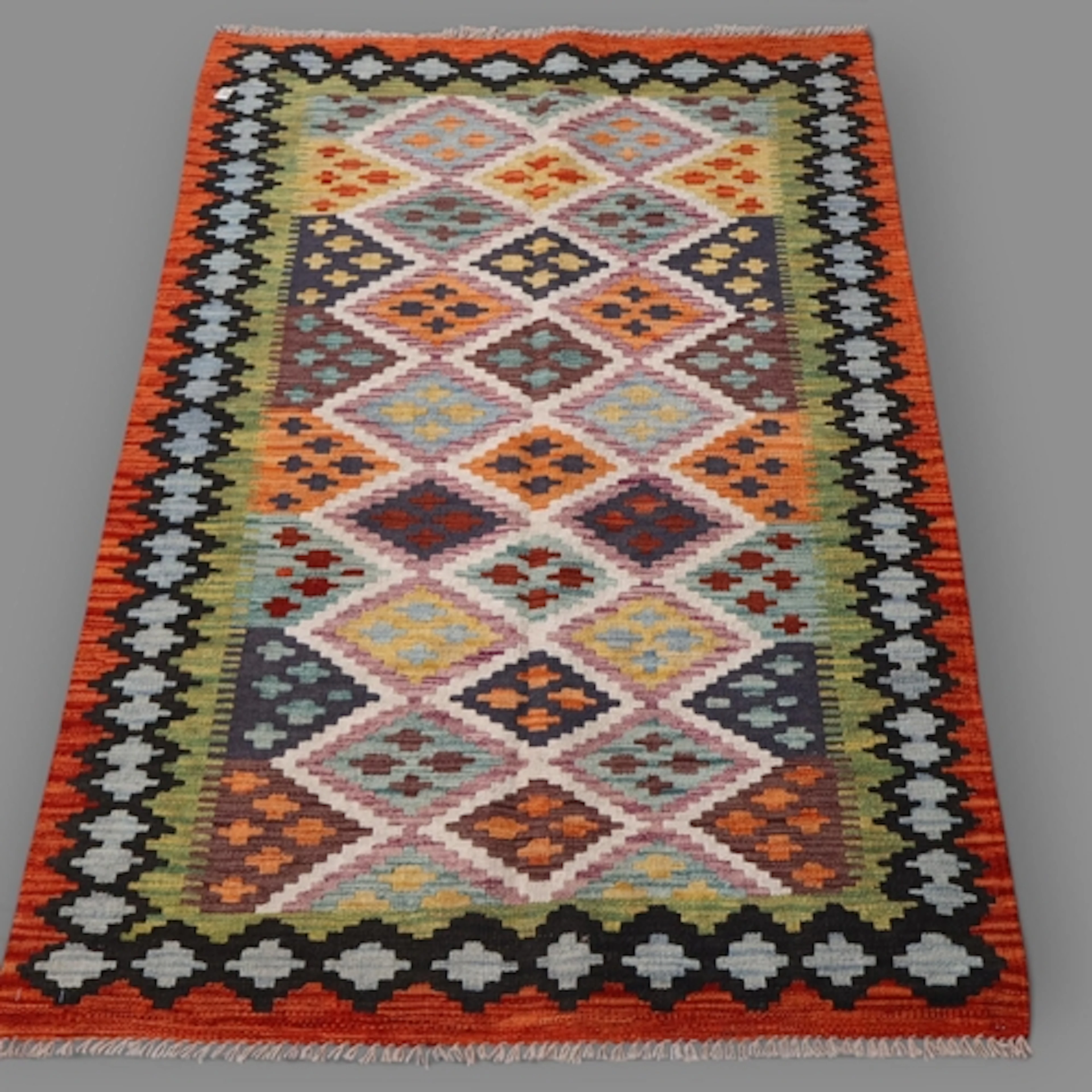 A Chobi Kilim rug. L159cm, W110cm.