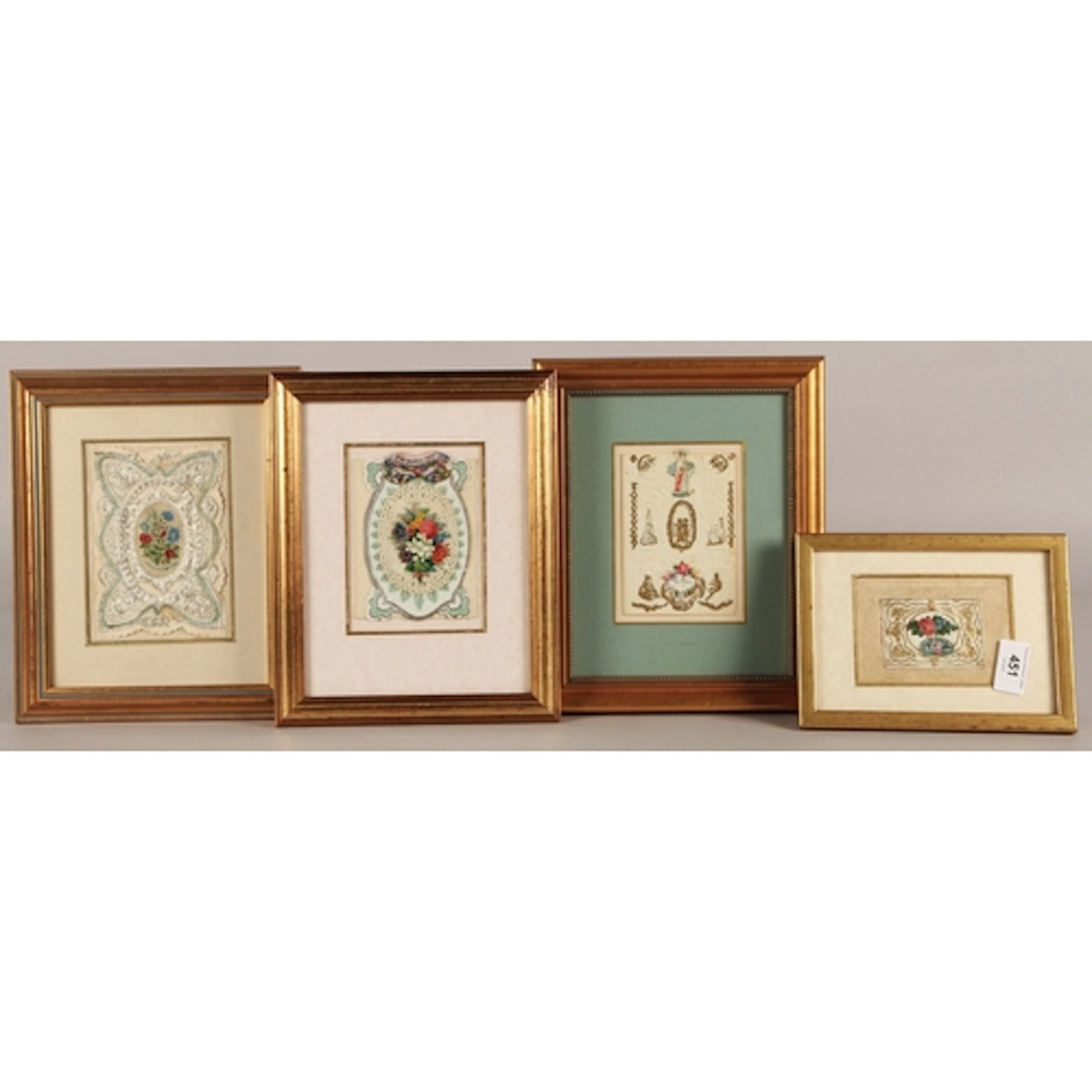 Four framed antique Victorian cards, embroidered lace and em...