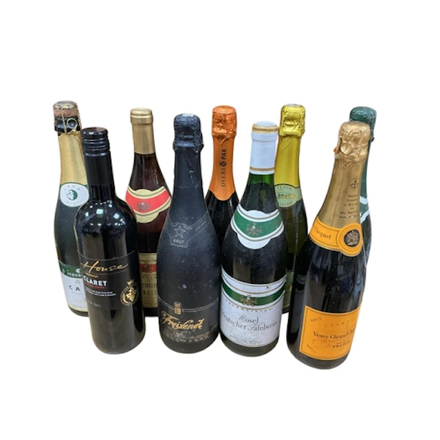 A collection of nine bottles of assorted wines and sparkling...