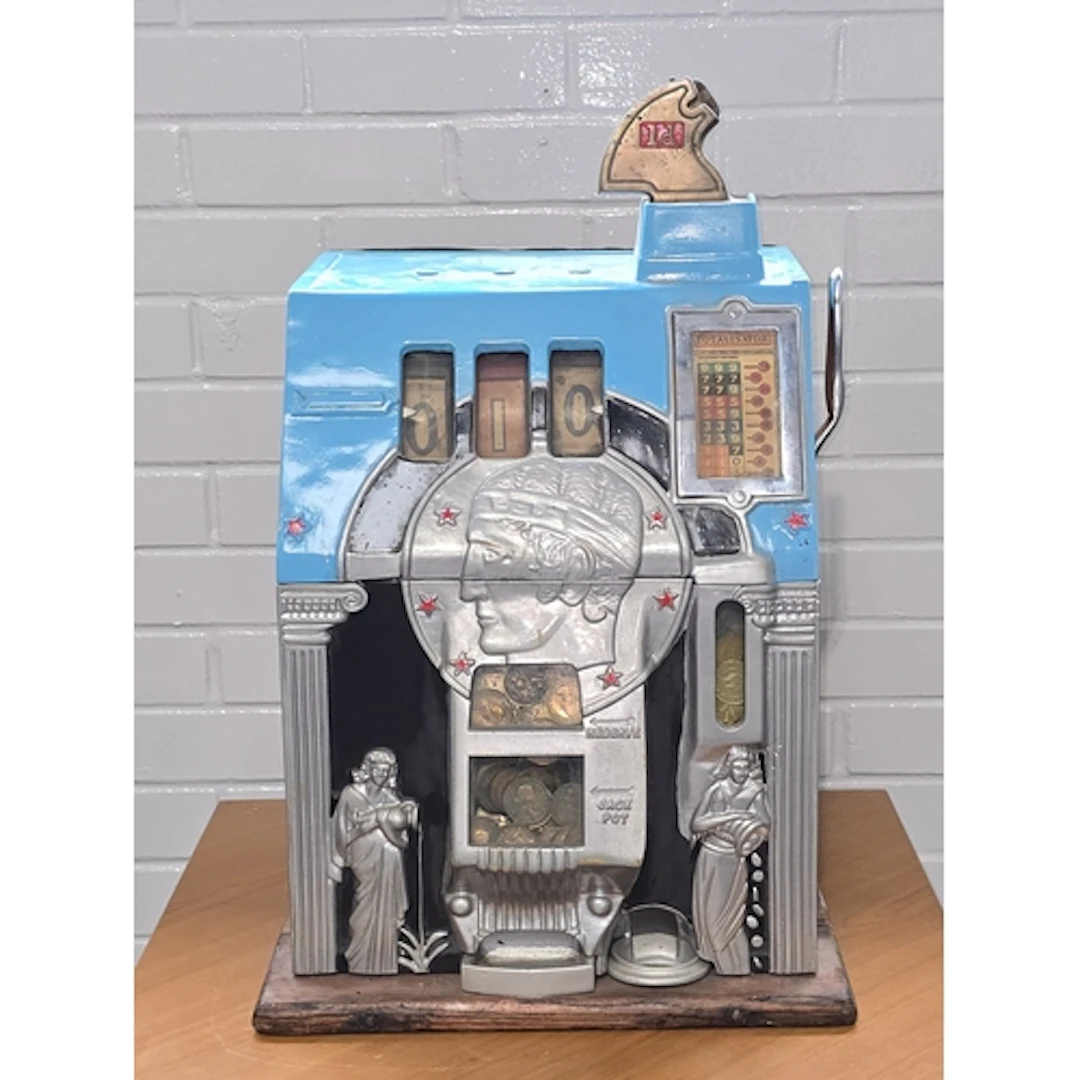 Vintage Firman's Roman Head slot machine. Works on old penny...