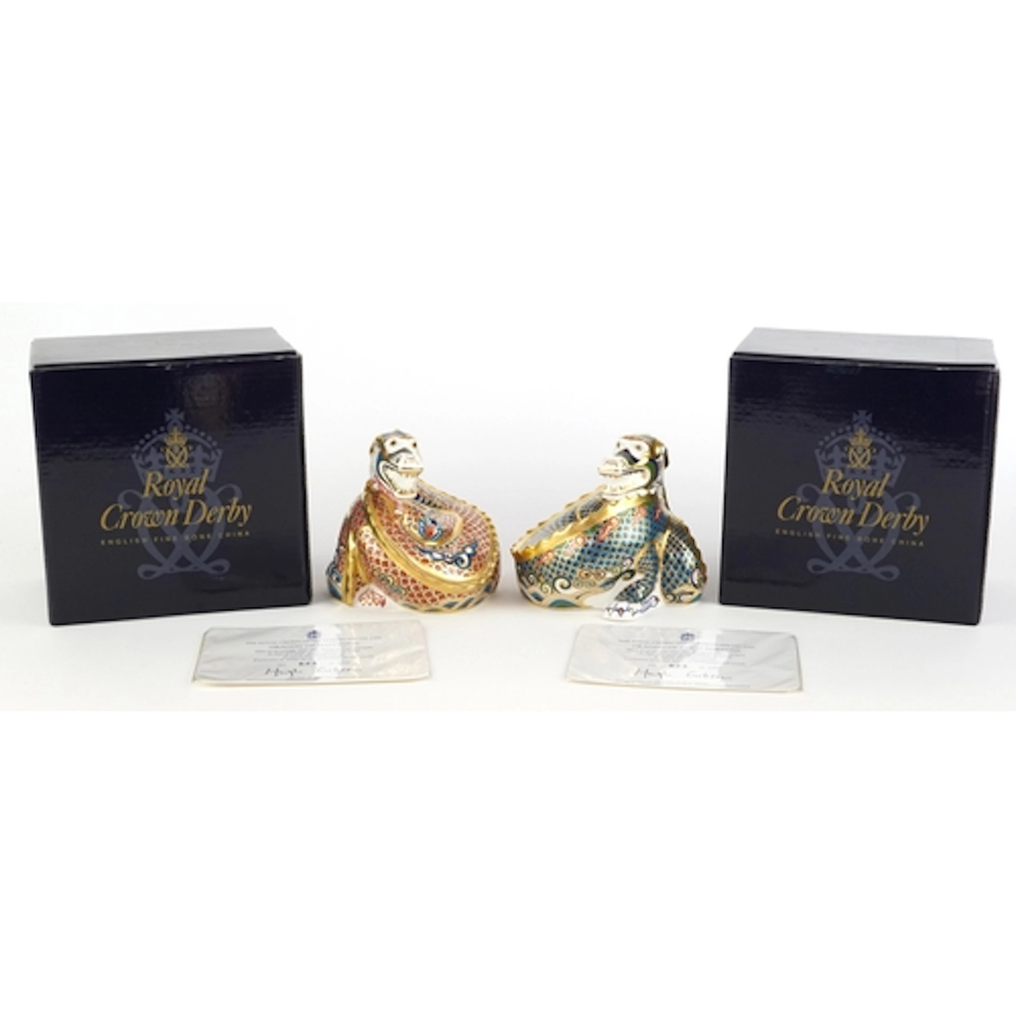 Two Royal Crown Derby paperweights comprising Dragon of Happ...