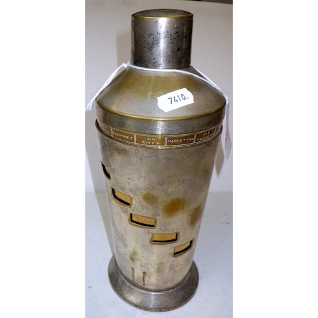 A vintage silver plated cocktail shaker