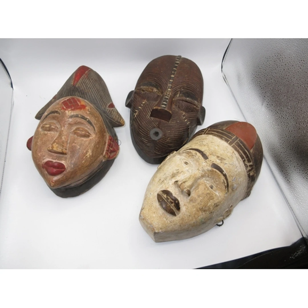 Three African Carved Wood Masks