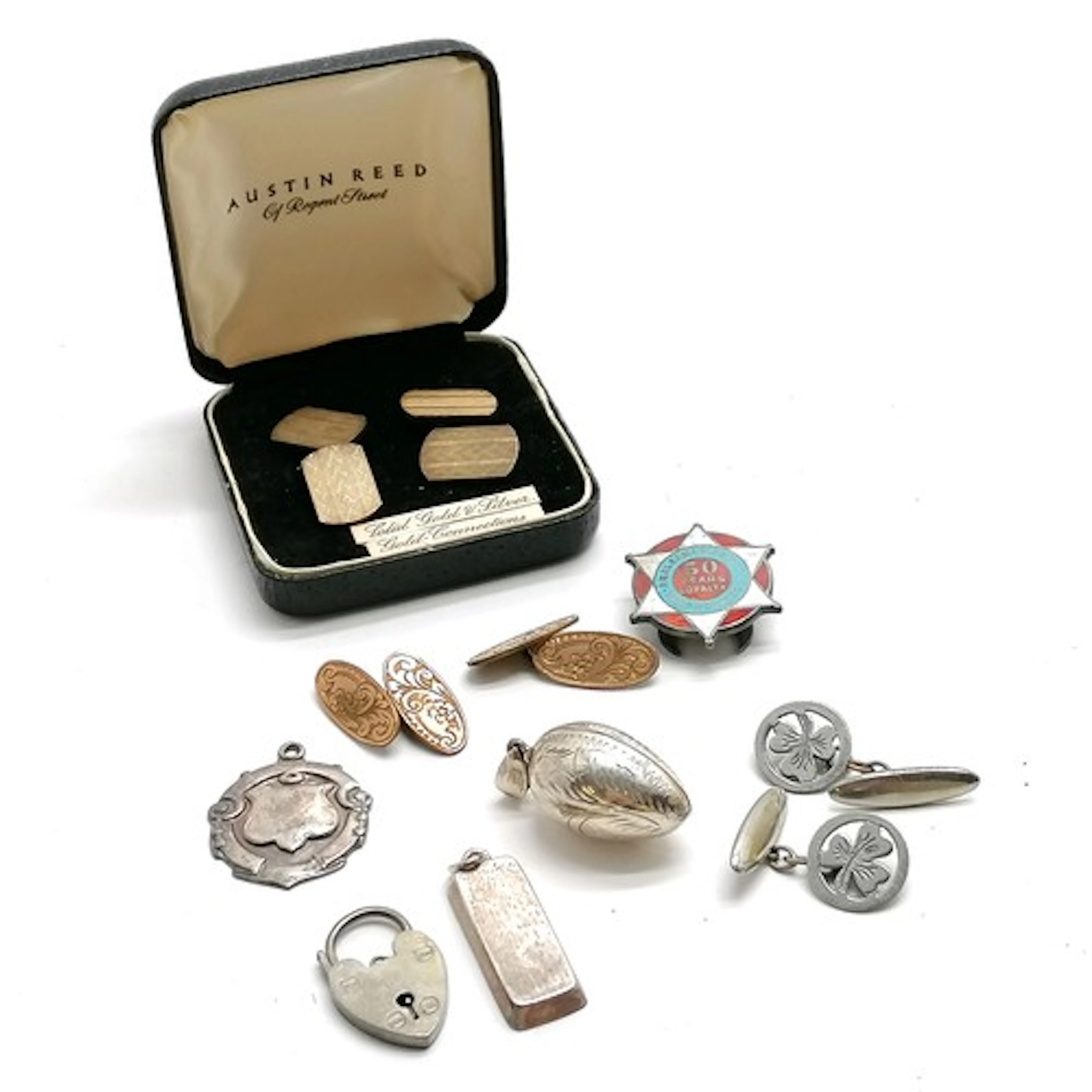Silver 'easter egg' locket pendant, unmarked ingot pendant, ...