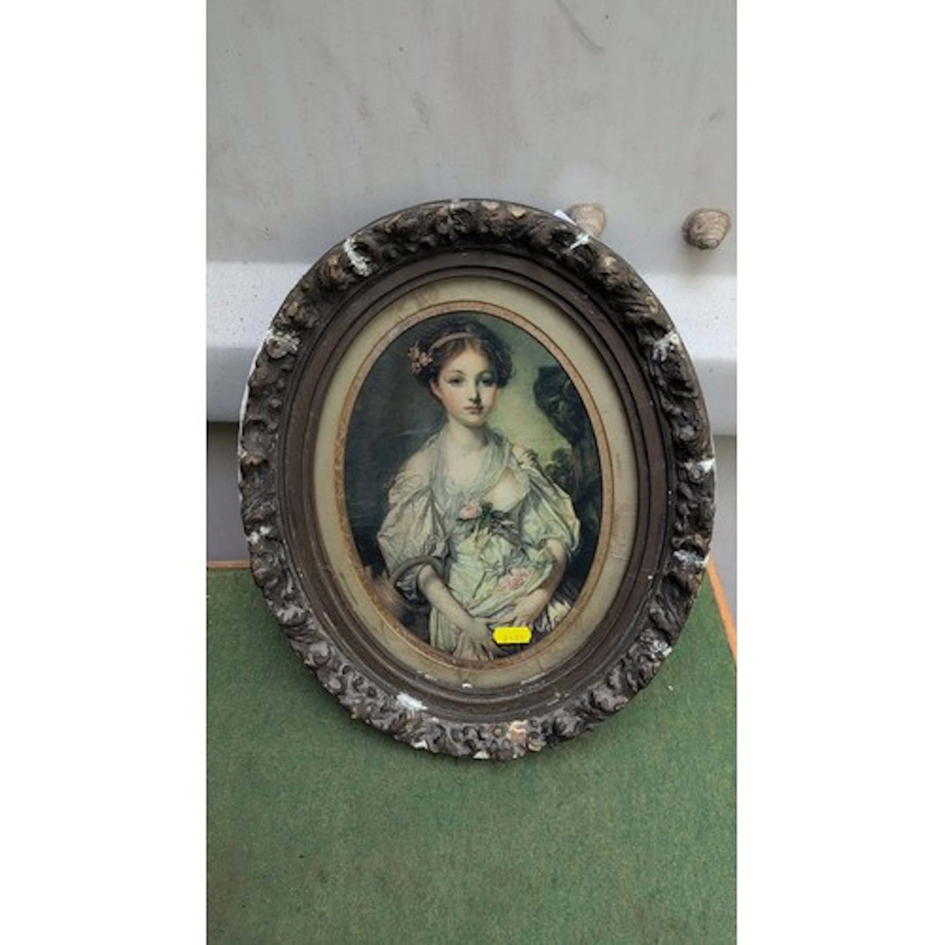 19th century oval portrait print, depicting a young woman wi...