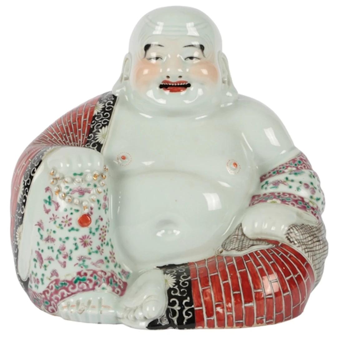 A large Chinese enamelled porcelain seated figure of Budai, ...