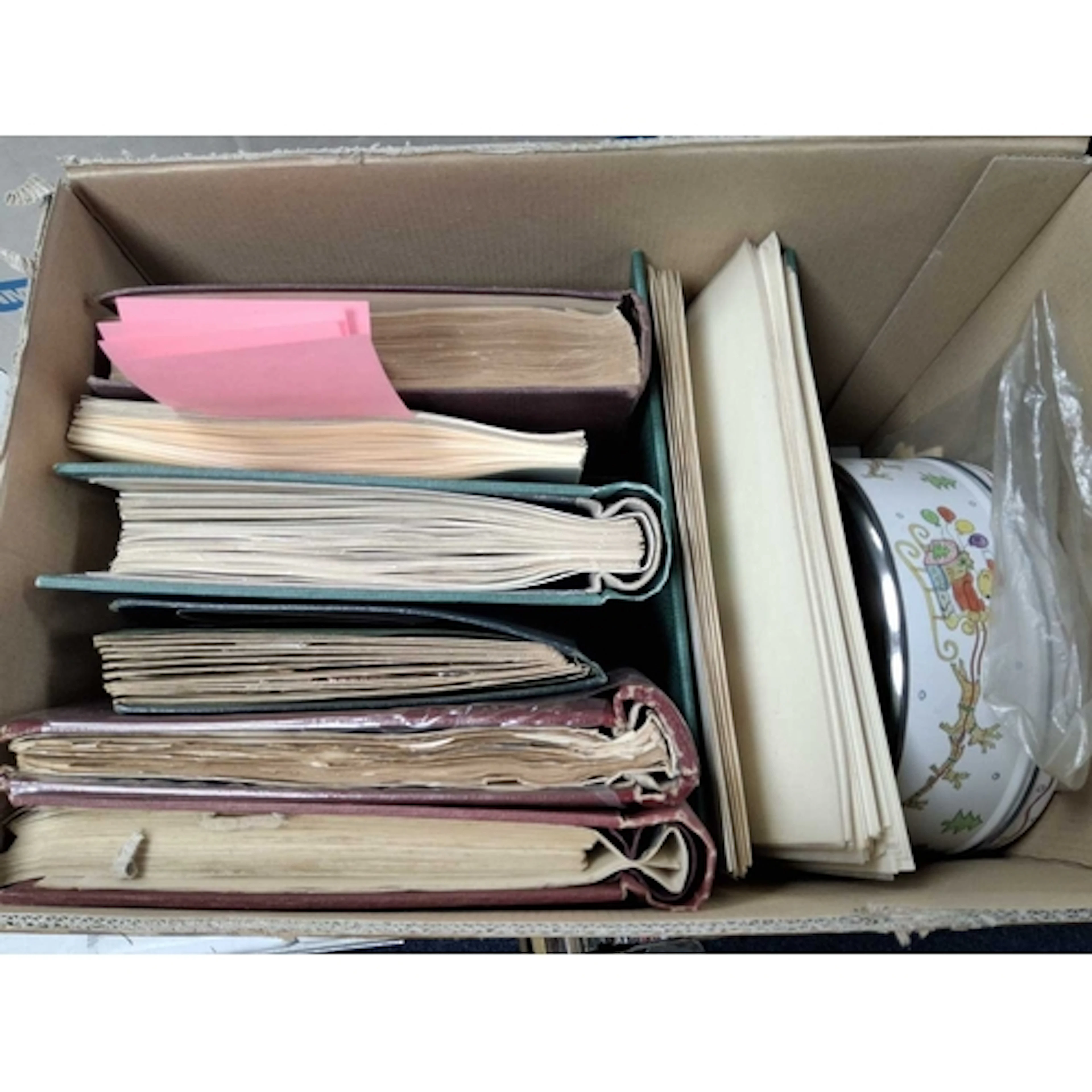 Box of stamps in albums and loose in a tin. We note worldwid...