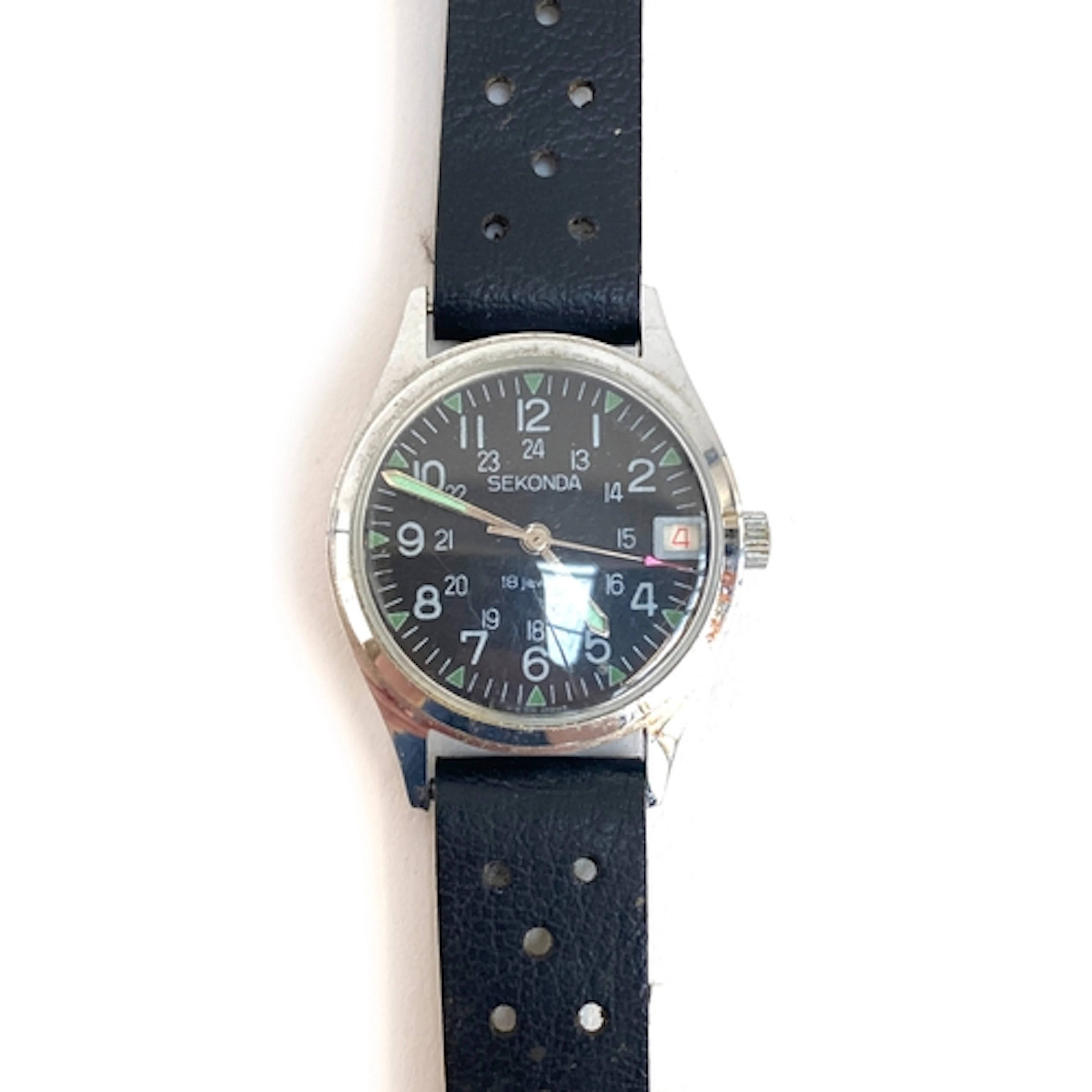 A vintage Sekonda Vostok Field Watch, on a black leather str...