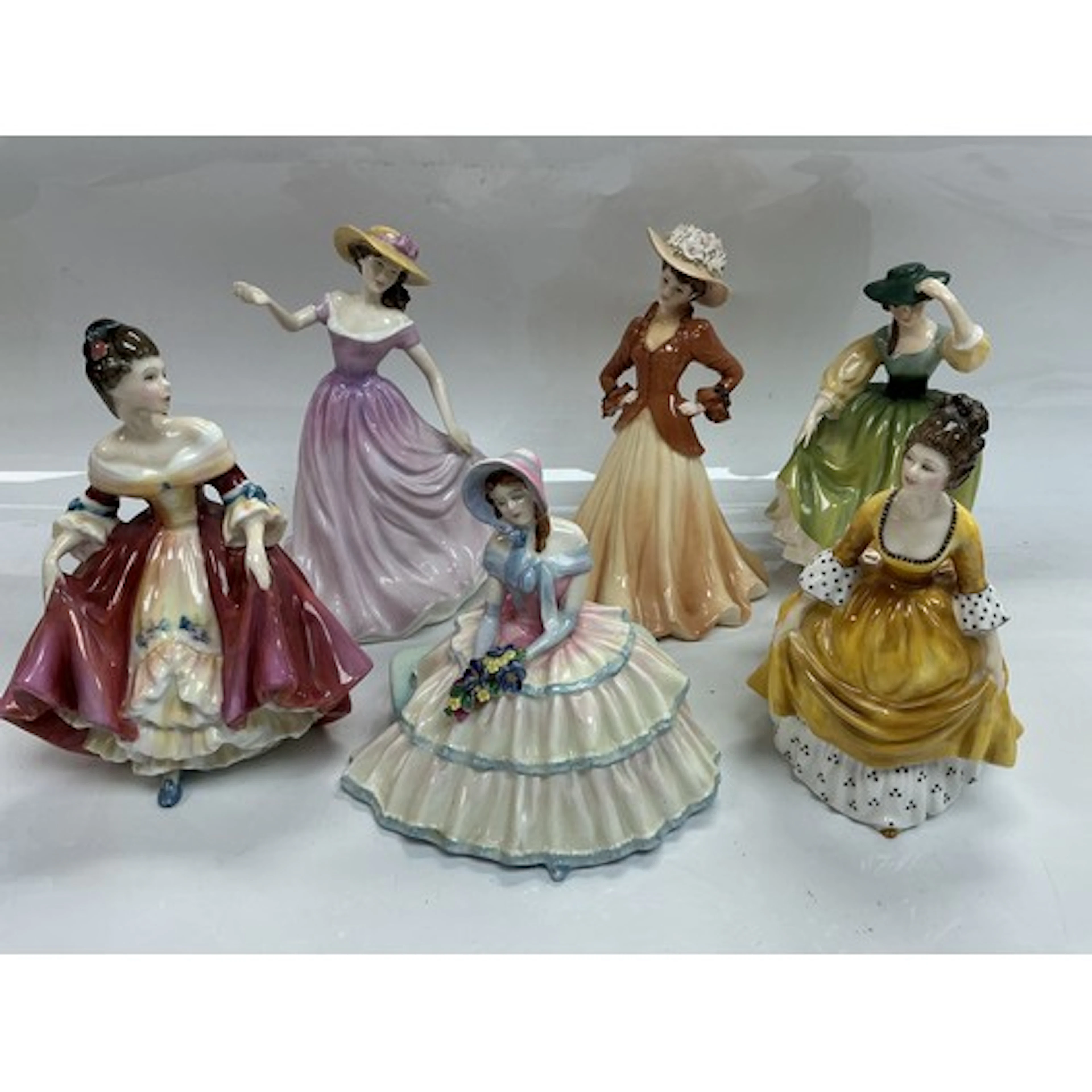 Six Royal Doulton and Coalport figures of ladies comprising ...