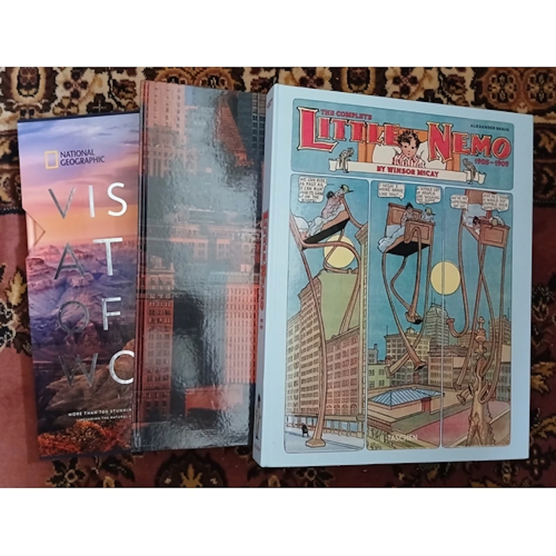 Nine boxes of assorted mainly hardback books including ficti...