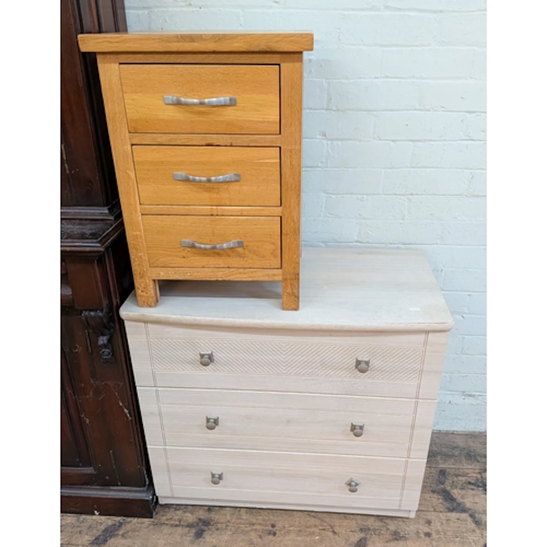 A small modern limed oak chest of three drawers and a three ...