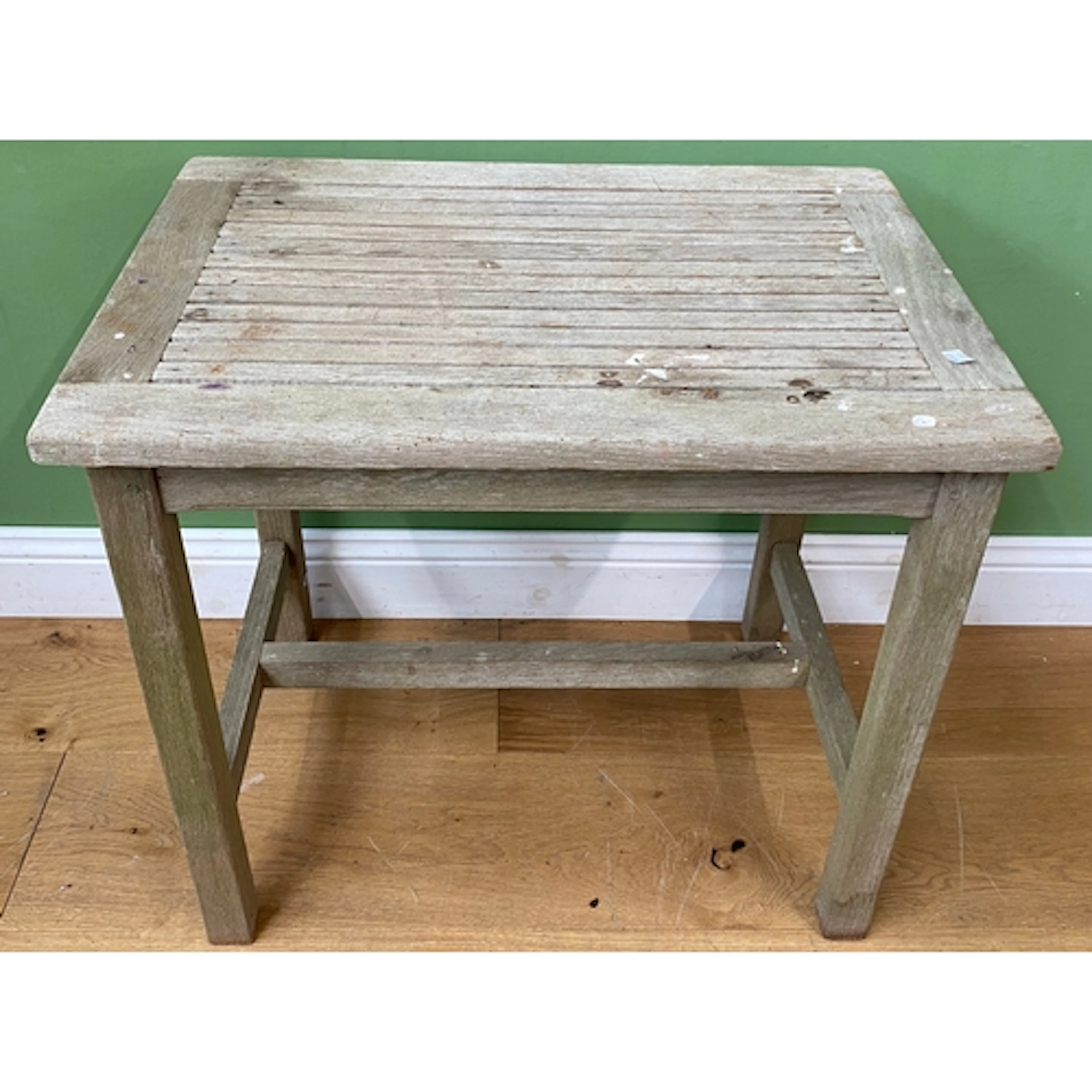 A small teak garden table, 76x53x69cmH