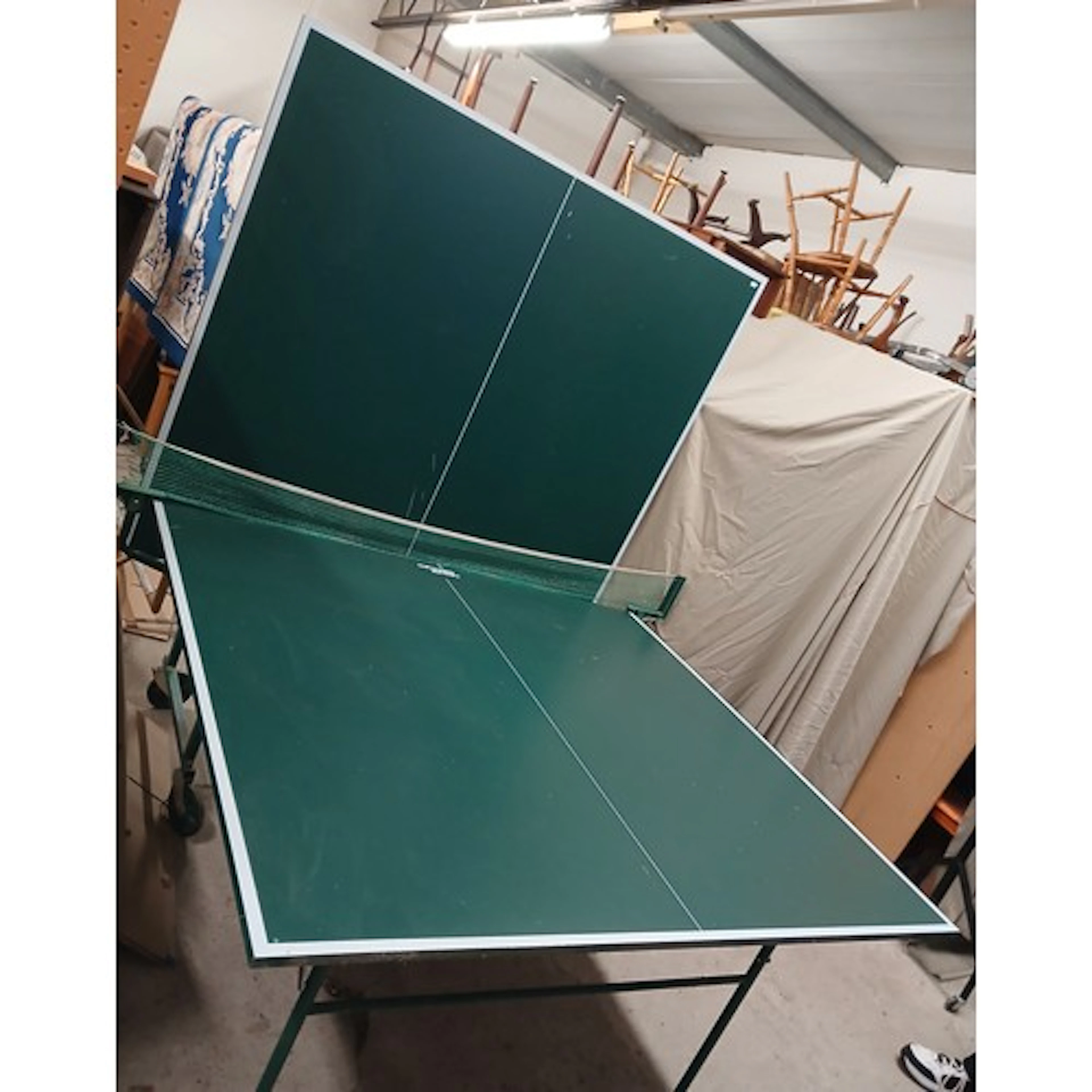 Folding tennis table.
