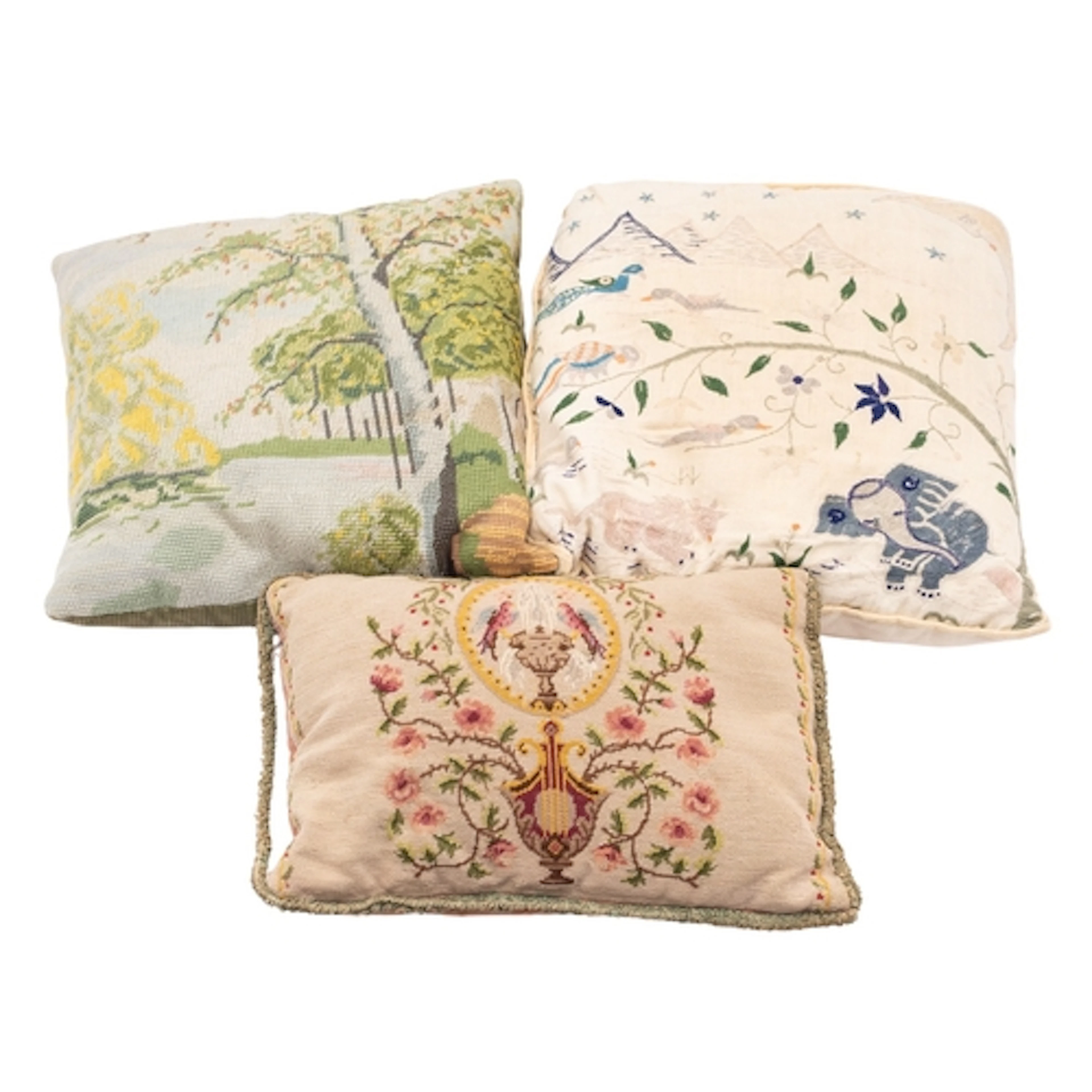 A group of nine various embroidered and fabric cushions; inc...