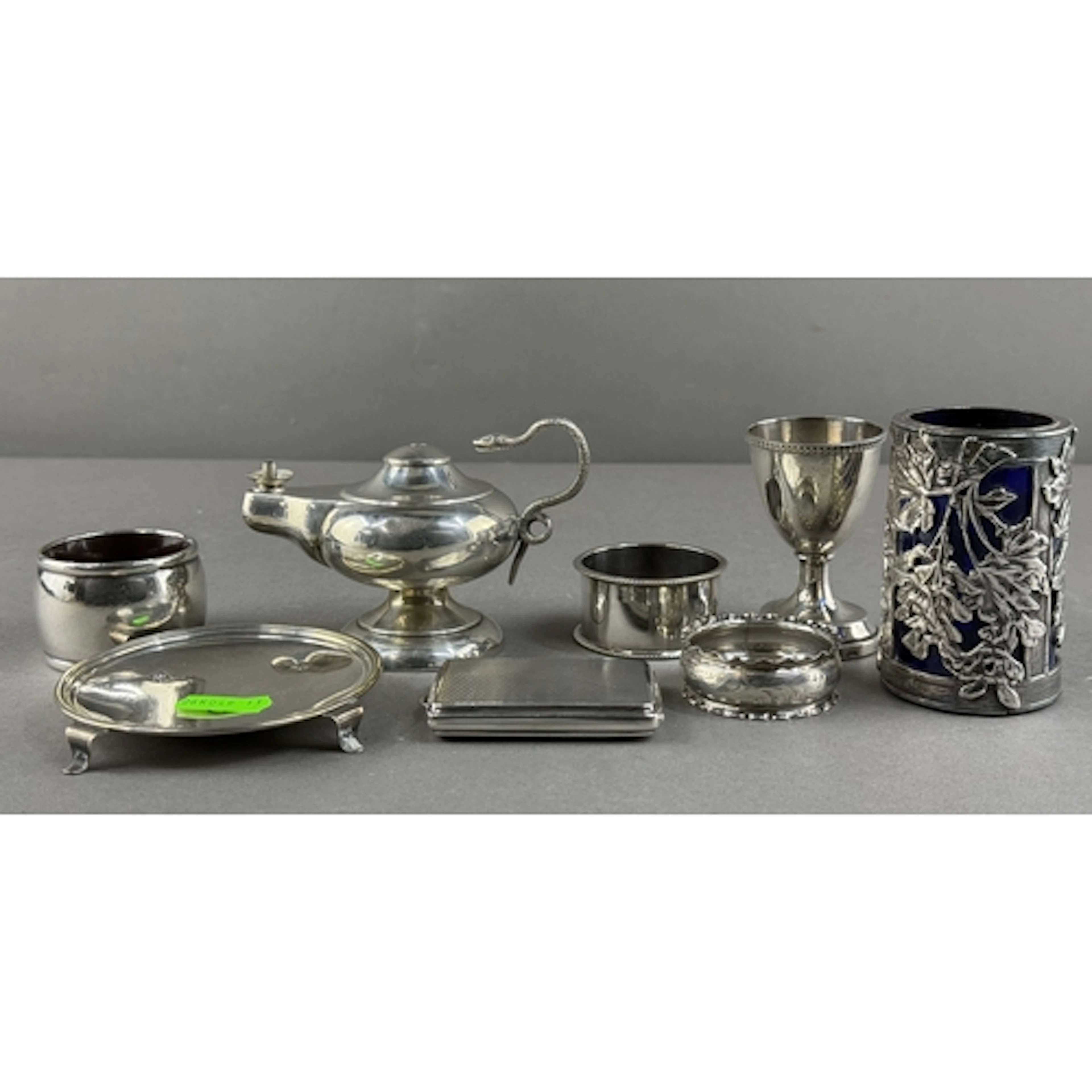 Silver: an 'Aladdins Lamp' style table lighter with snake ha...