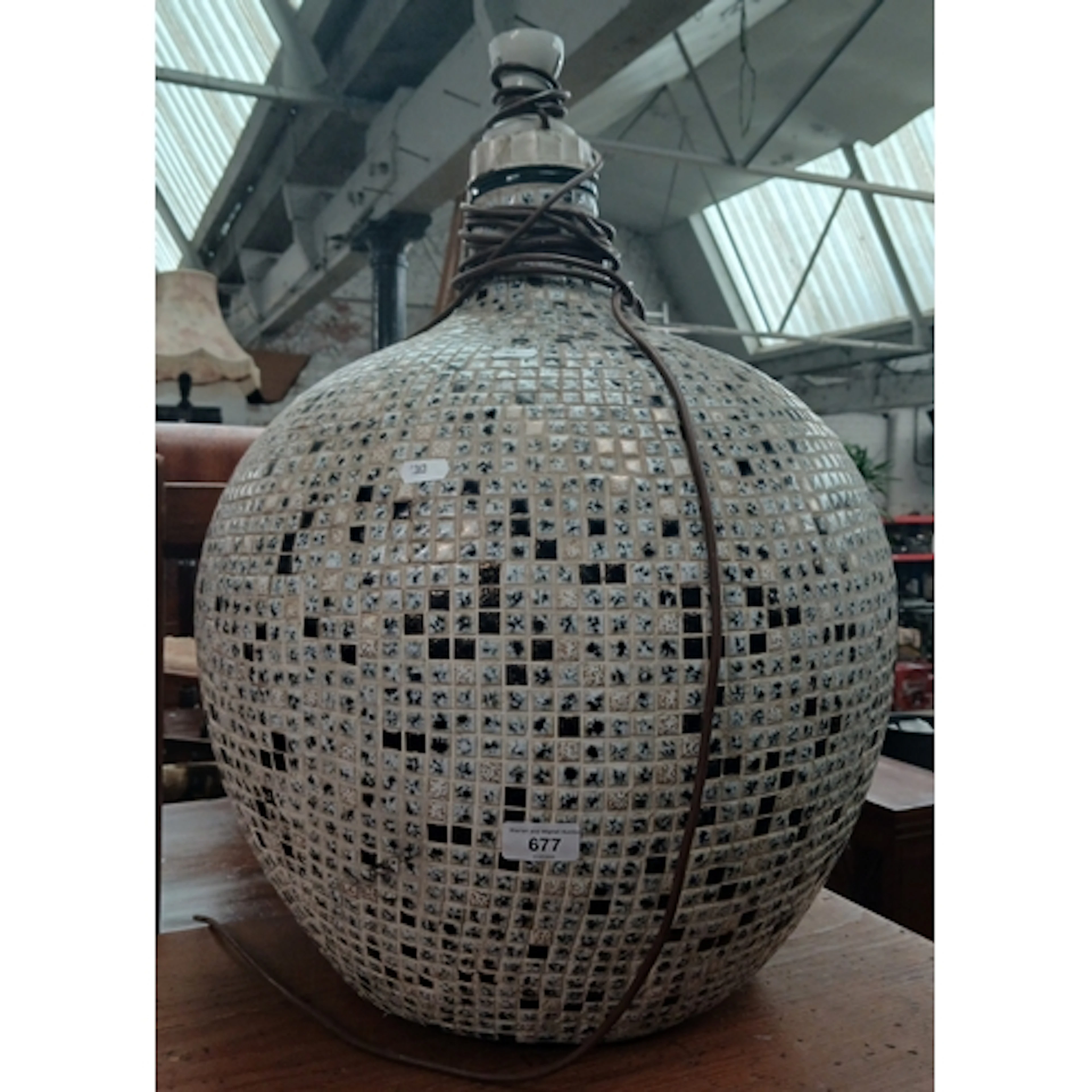 A micro-mosaic tile globular table lamp.