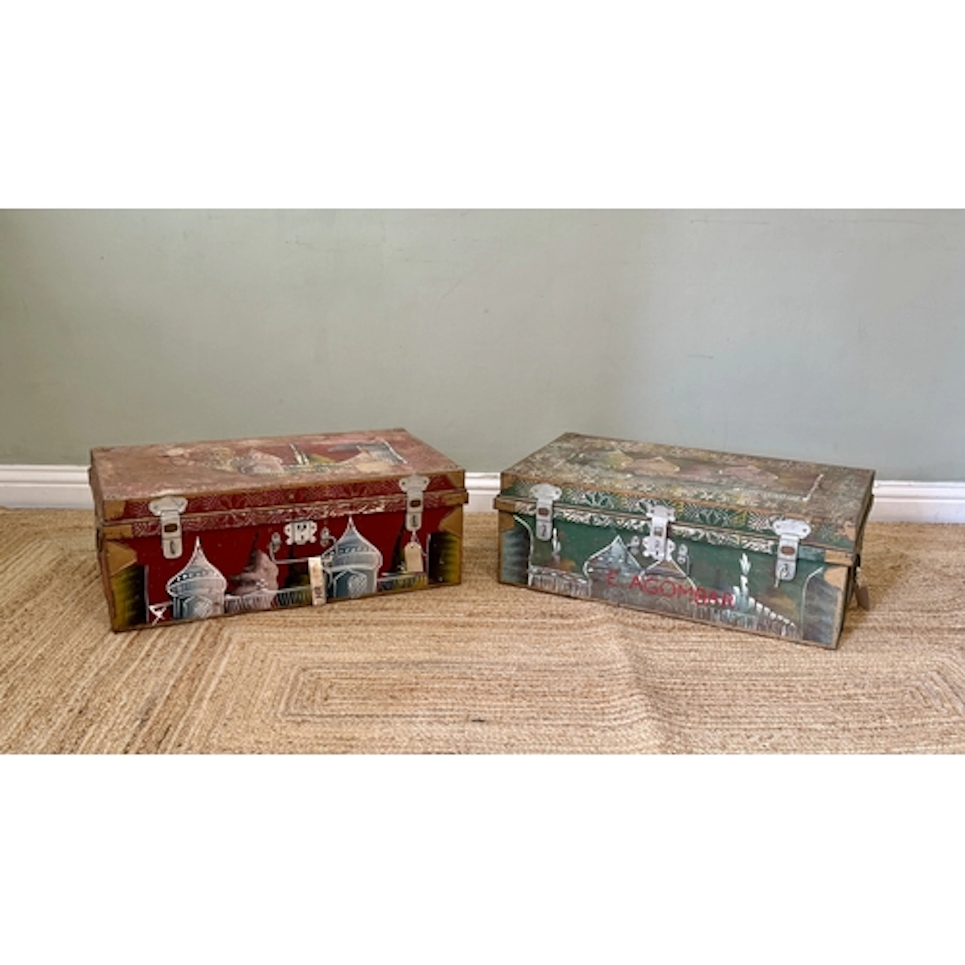 A matched pair of Indian folk art painted tin travel trunks ...
