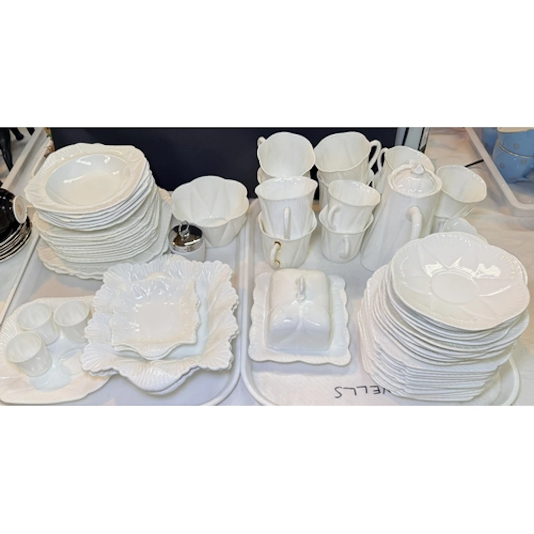 A vintage Shelley Dainty White part tea service with cups an...