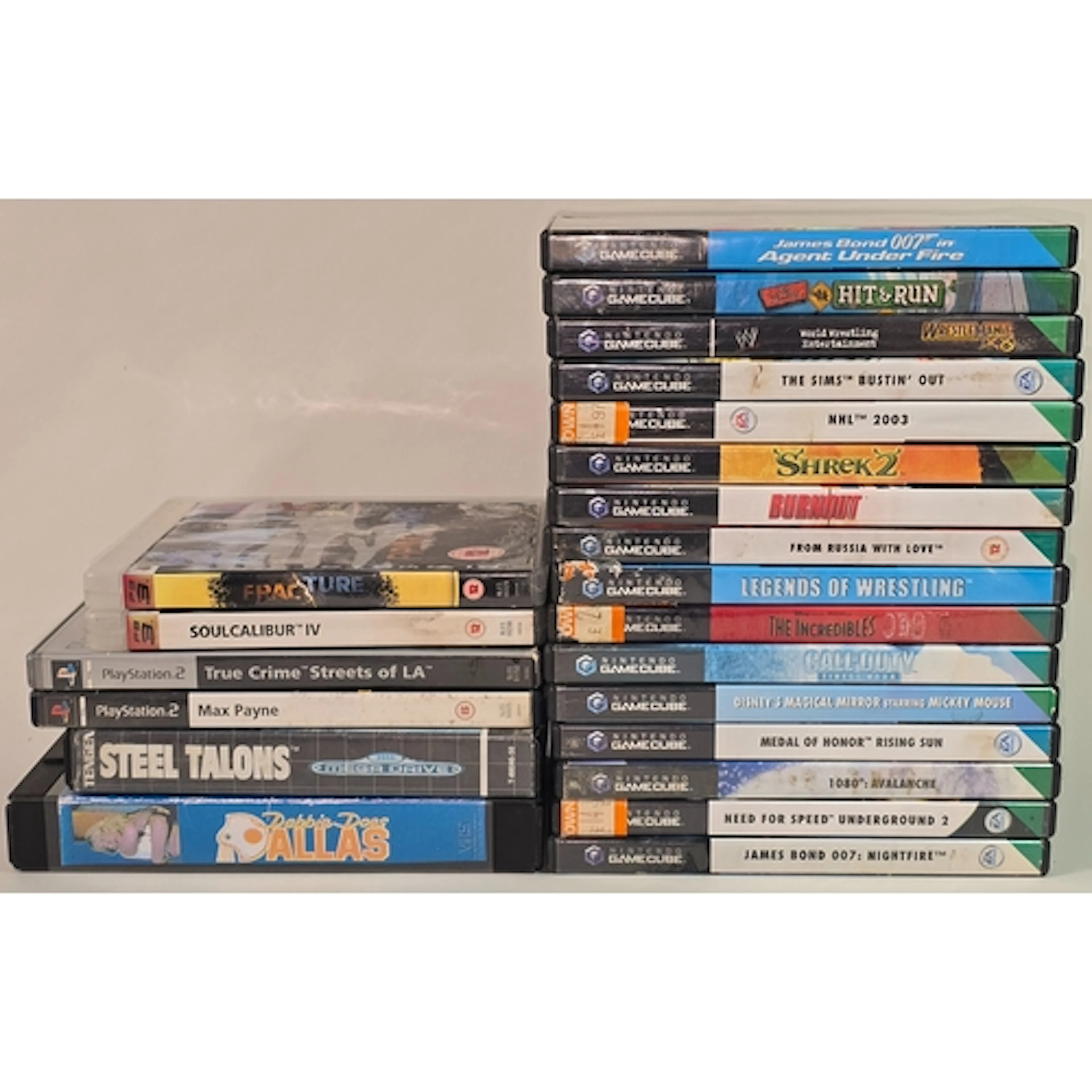 A collection of mostly Nintendo Gamecube games. Evidence of ...