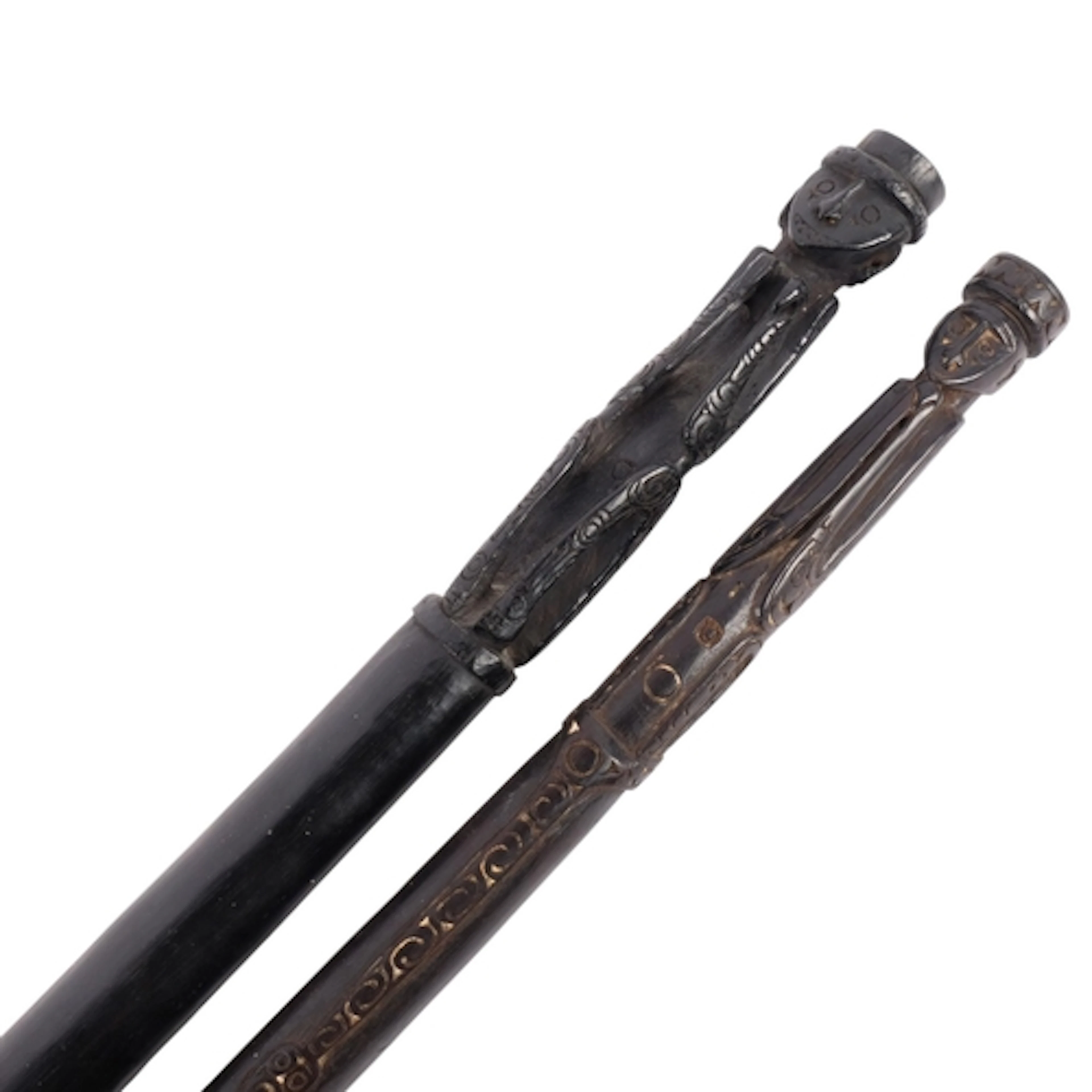 2 Vintage ebony walking canes, with carved figure tops