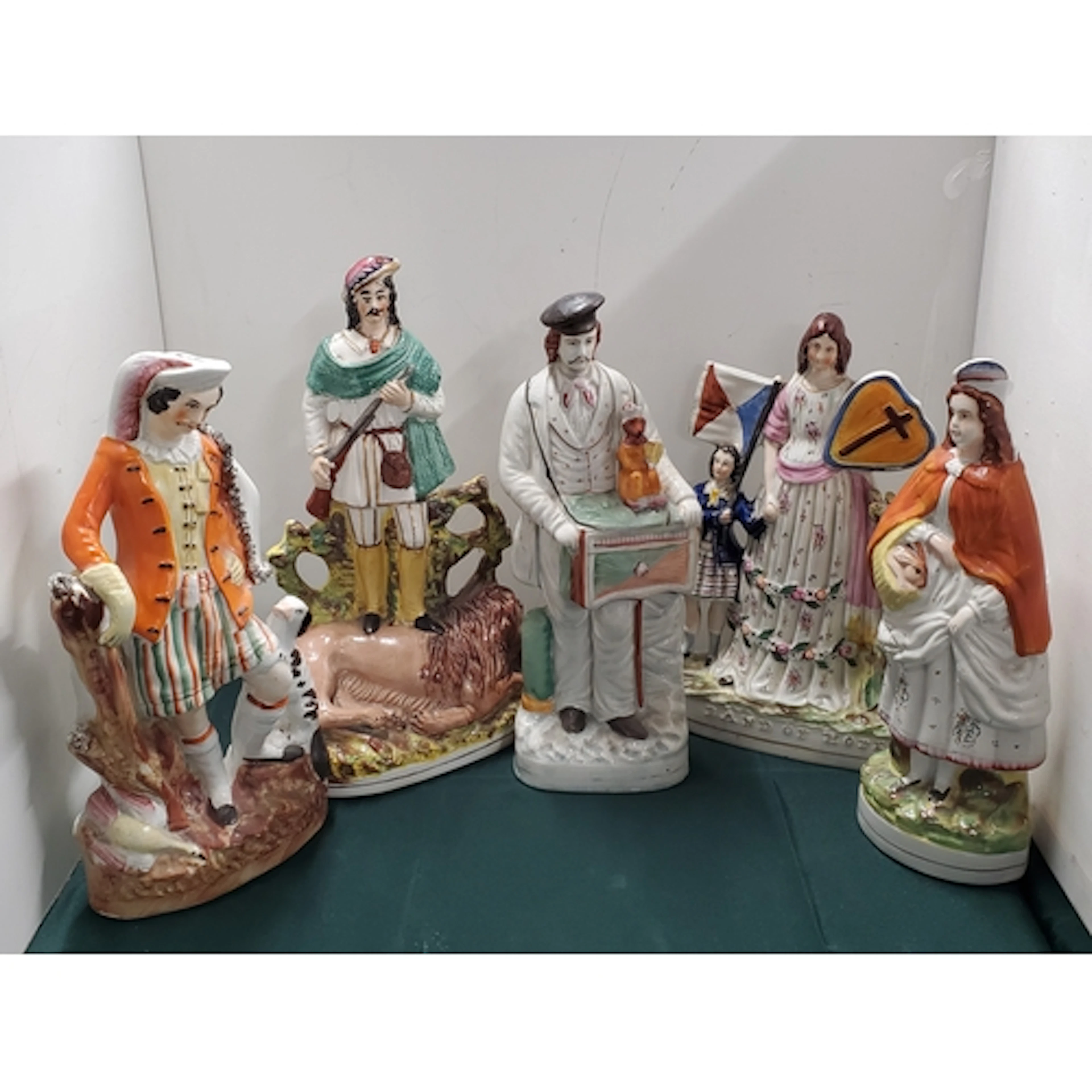 A group of Staffordshire Figures including a flatback 'Band ...