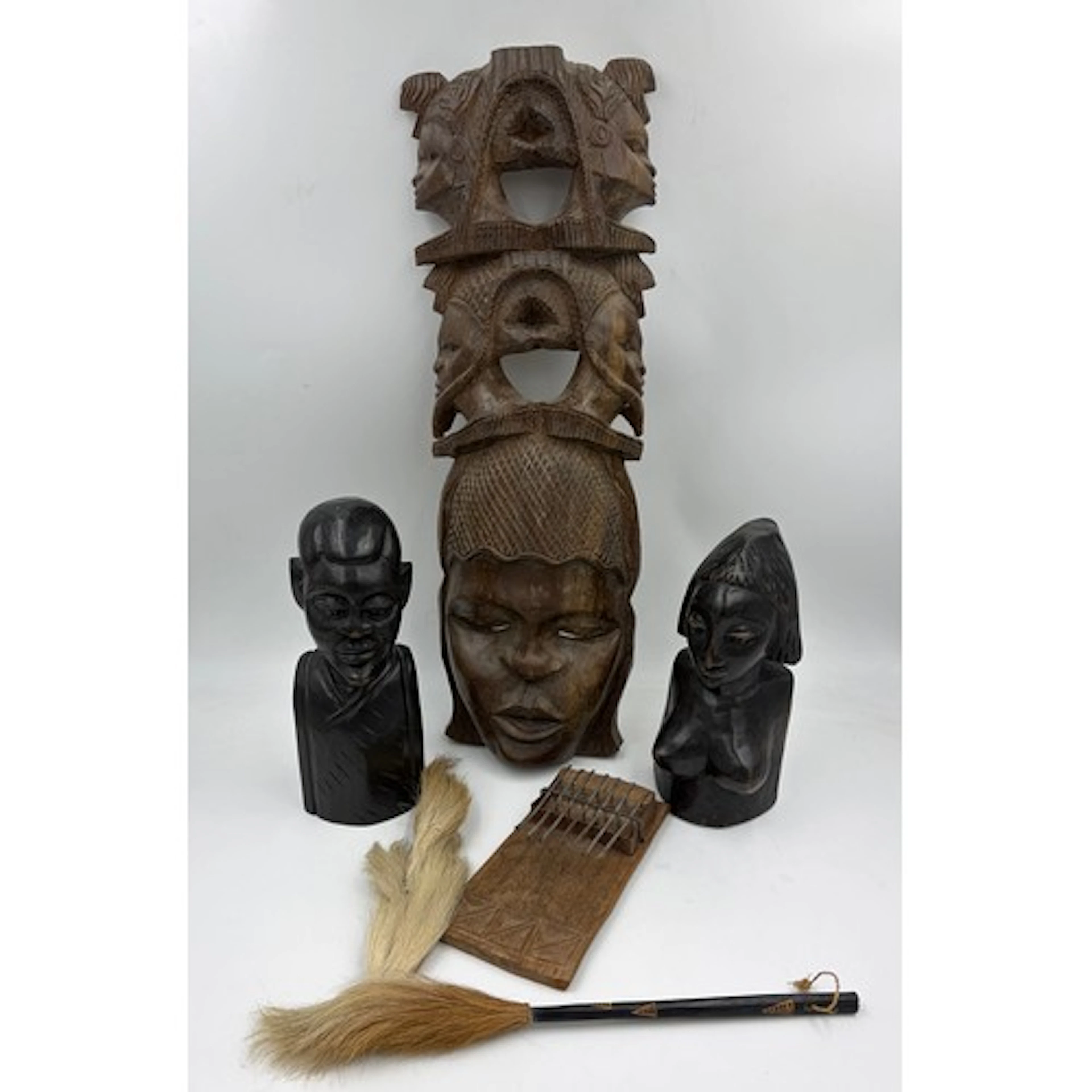 A collection of African tribal items to include a Kalimba (2...