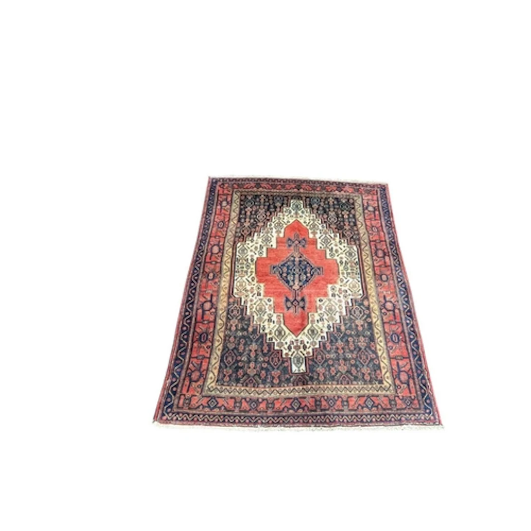 A vintage 20th century North West Persian Senneh carpet floo...