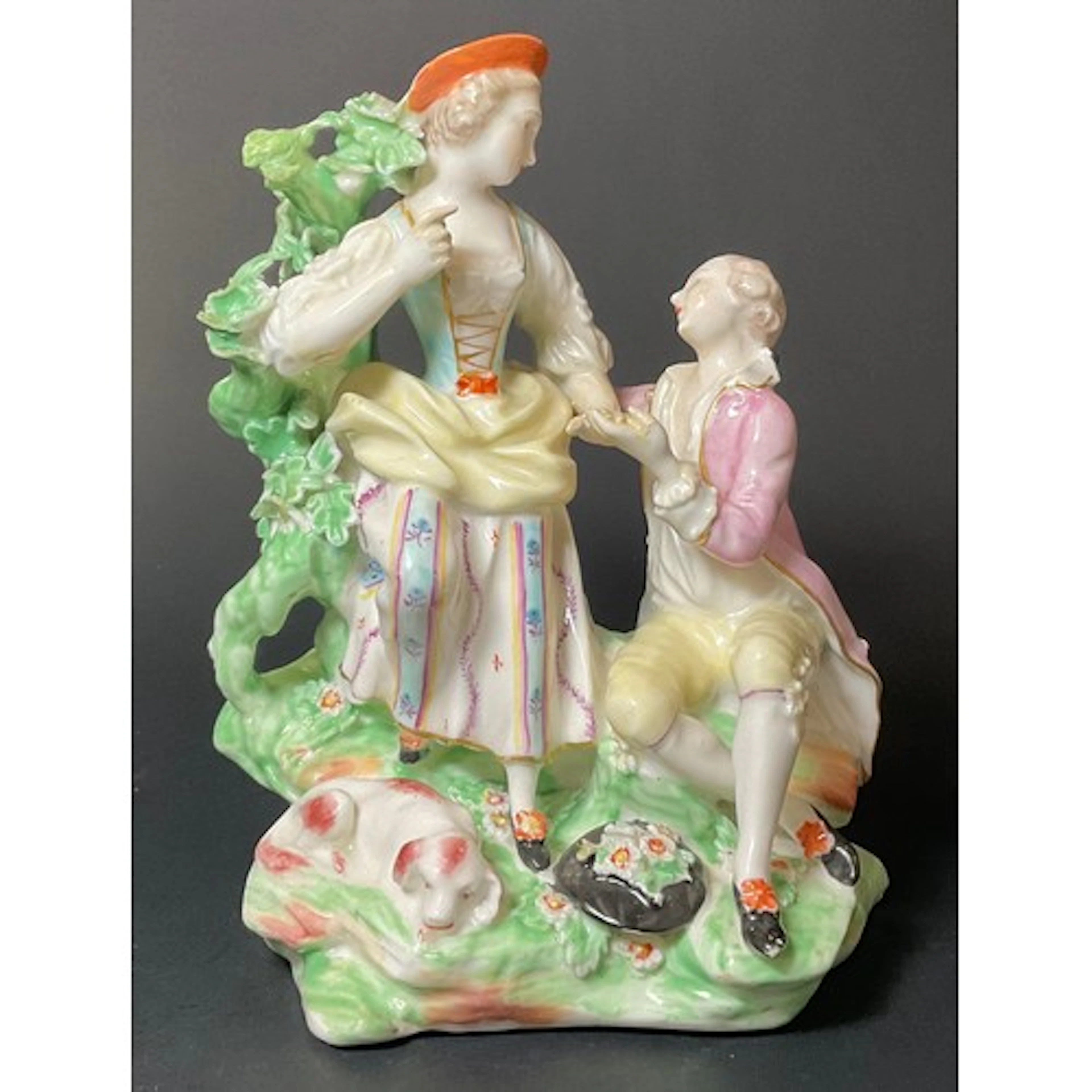 A Derby patch mark figural group, Pastoral Group with a Dog,...