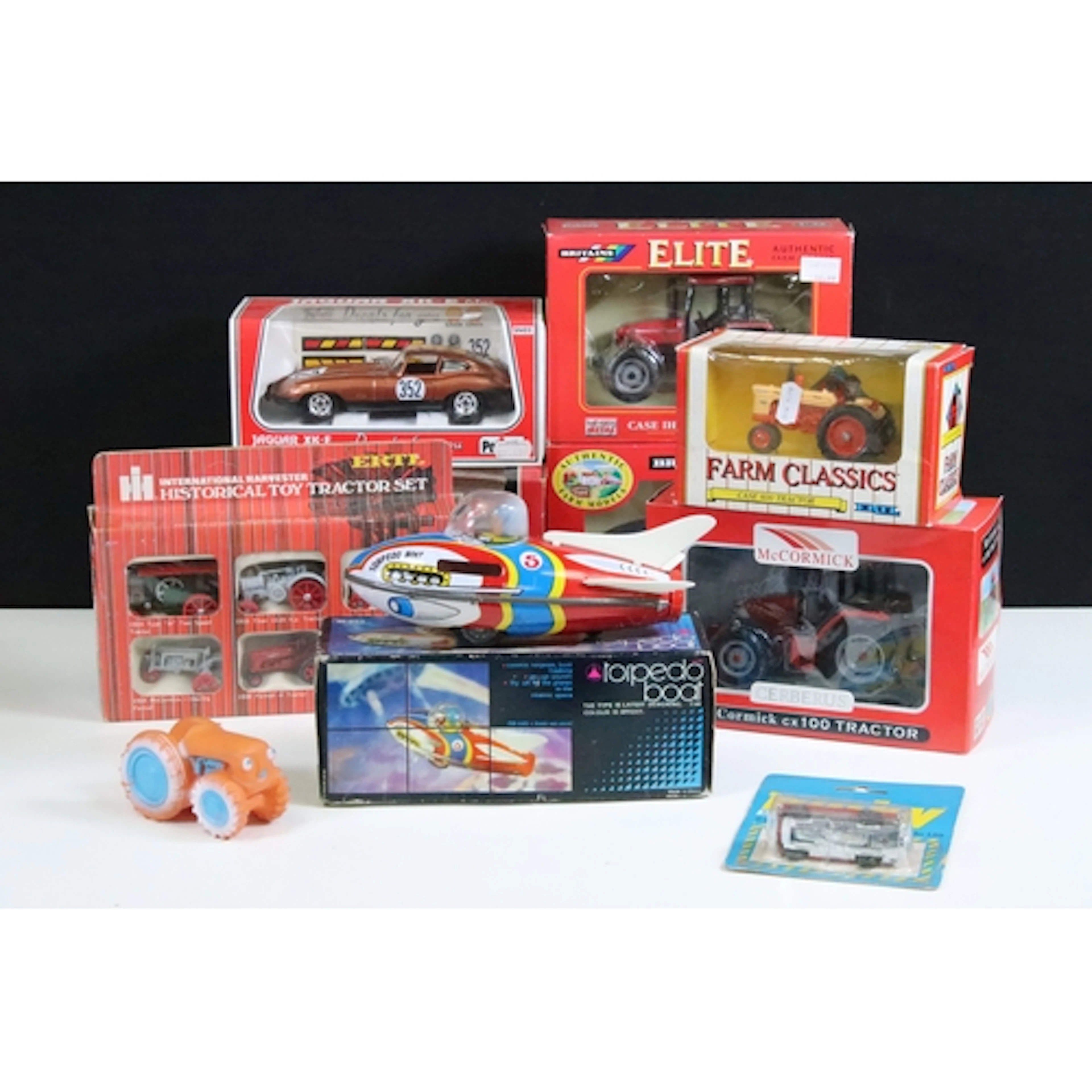 Eight boxed diecast models to include 5 x farming related ex...