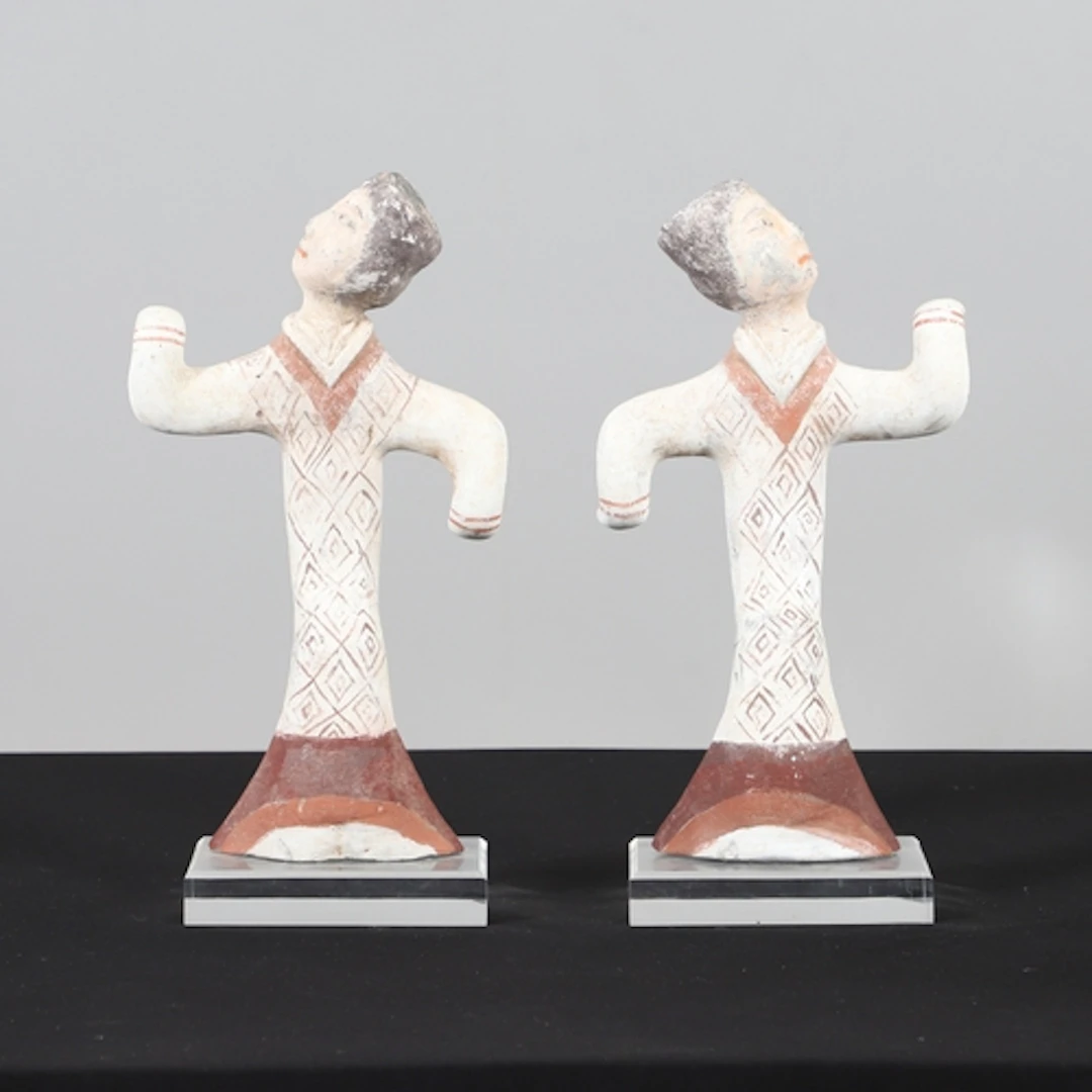 PAIR OF CHINESE PAINTED FIGURES - HAN DYNASTY. A pair of Chi...