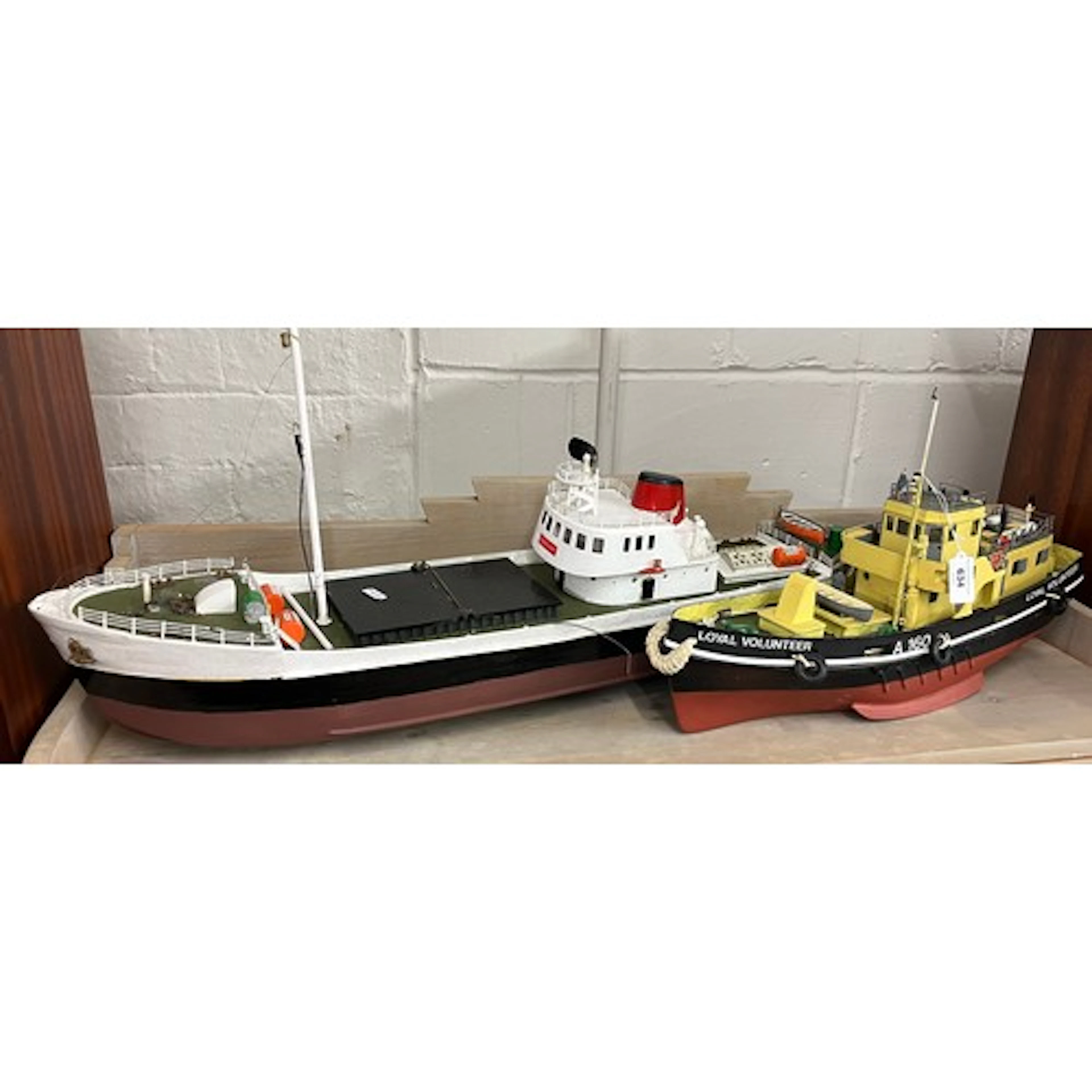 Two radio control model boats, including 'Loyal Volunteer'.