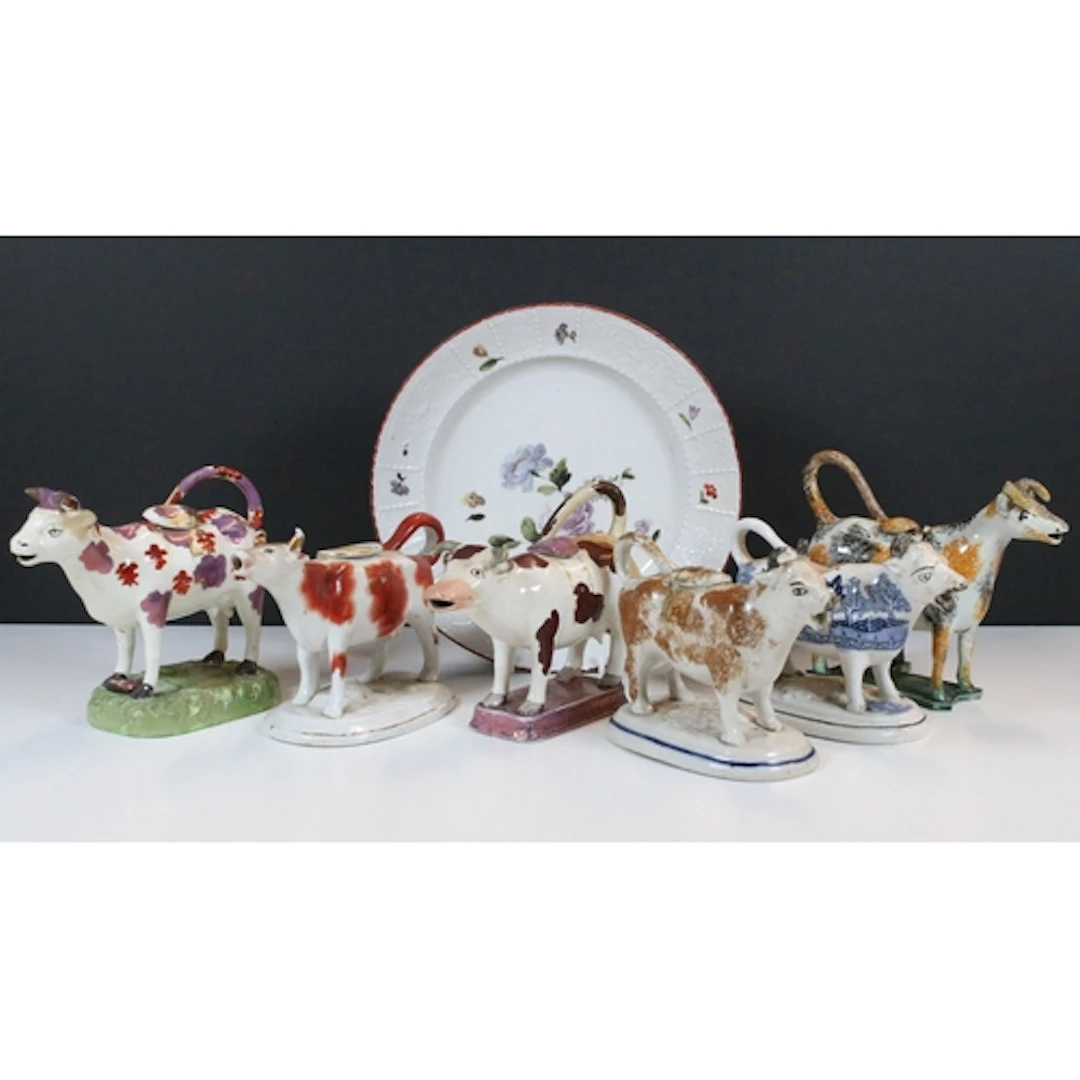 Collection of six early 19th century and later cow creamers,...