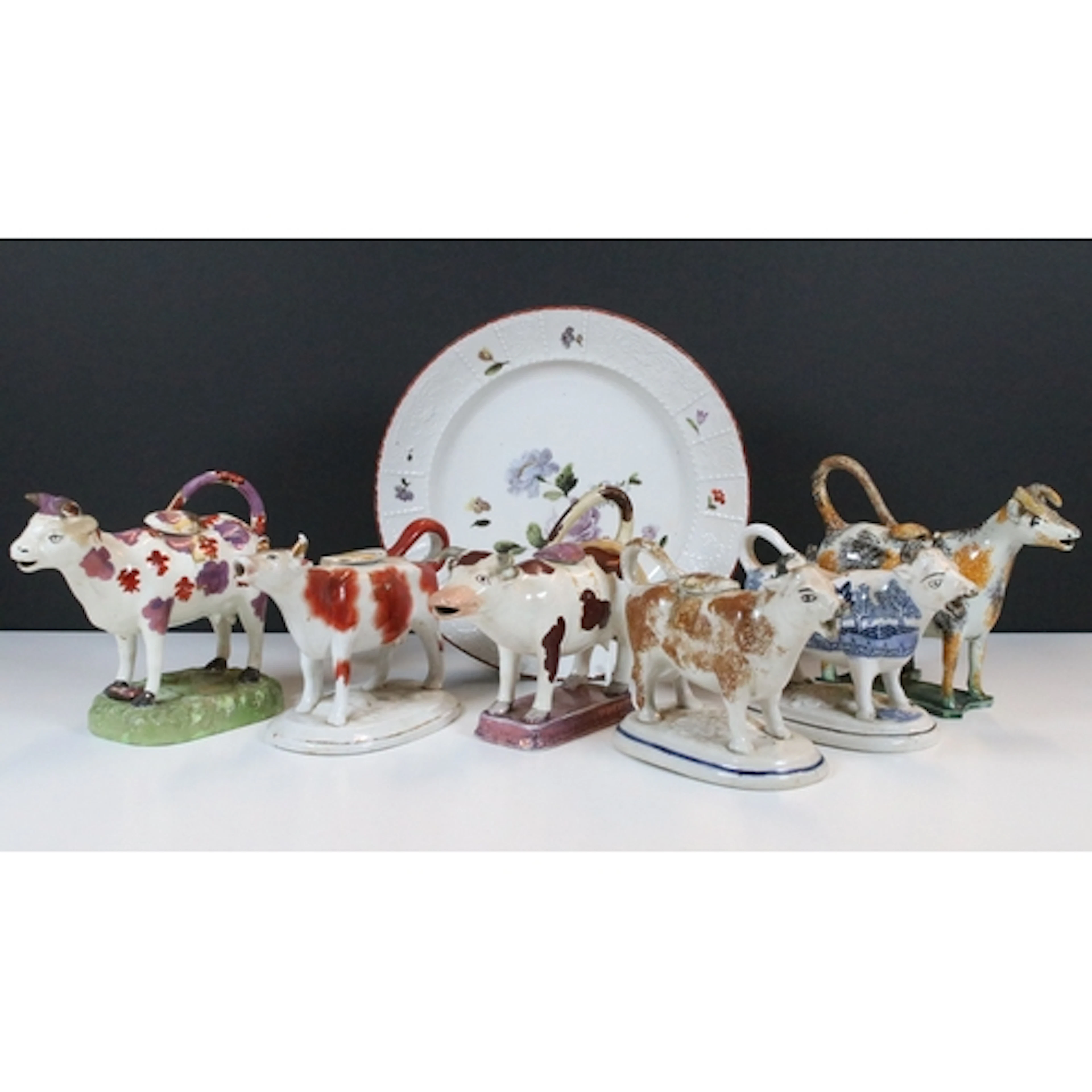 Collection of six early 19th century and later cow creamers,...