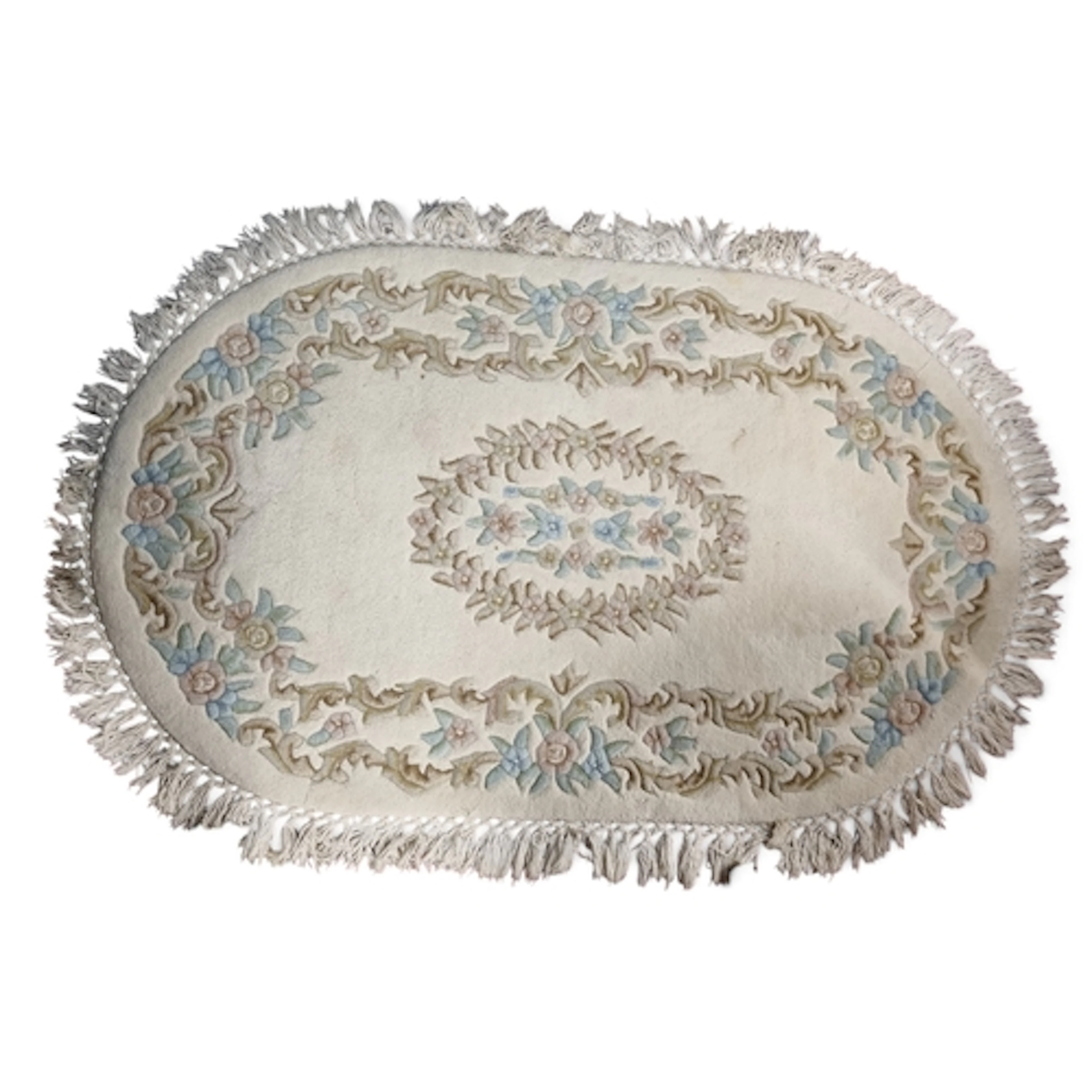 An Oriental cream ground oval Rug with floral outline. 180 x...