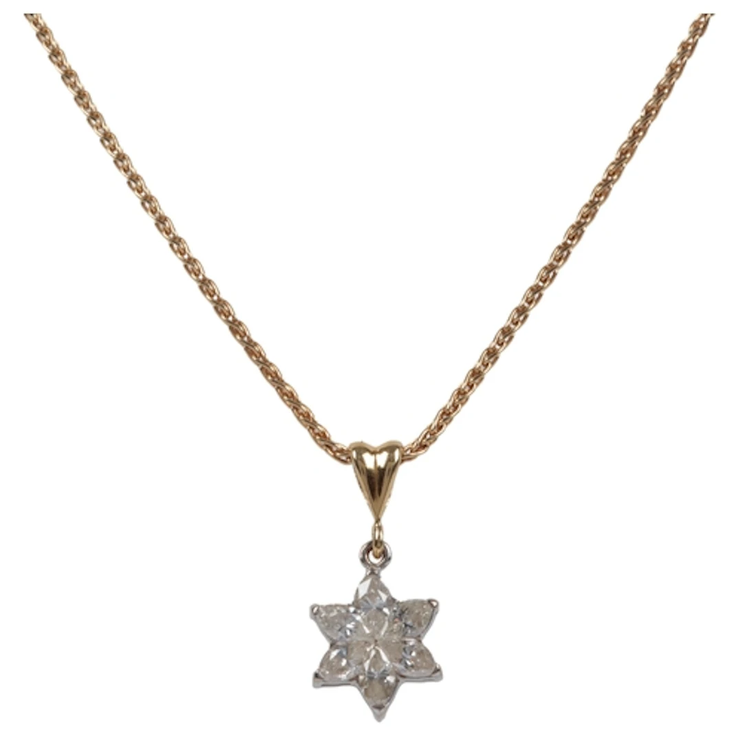A diamond cluster pendant, set with marquise-shaped diamonds...