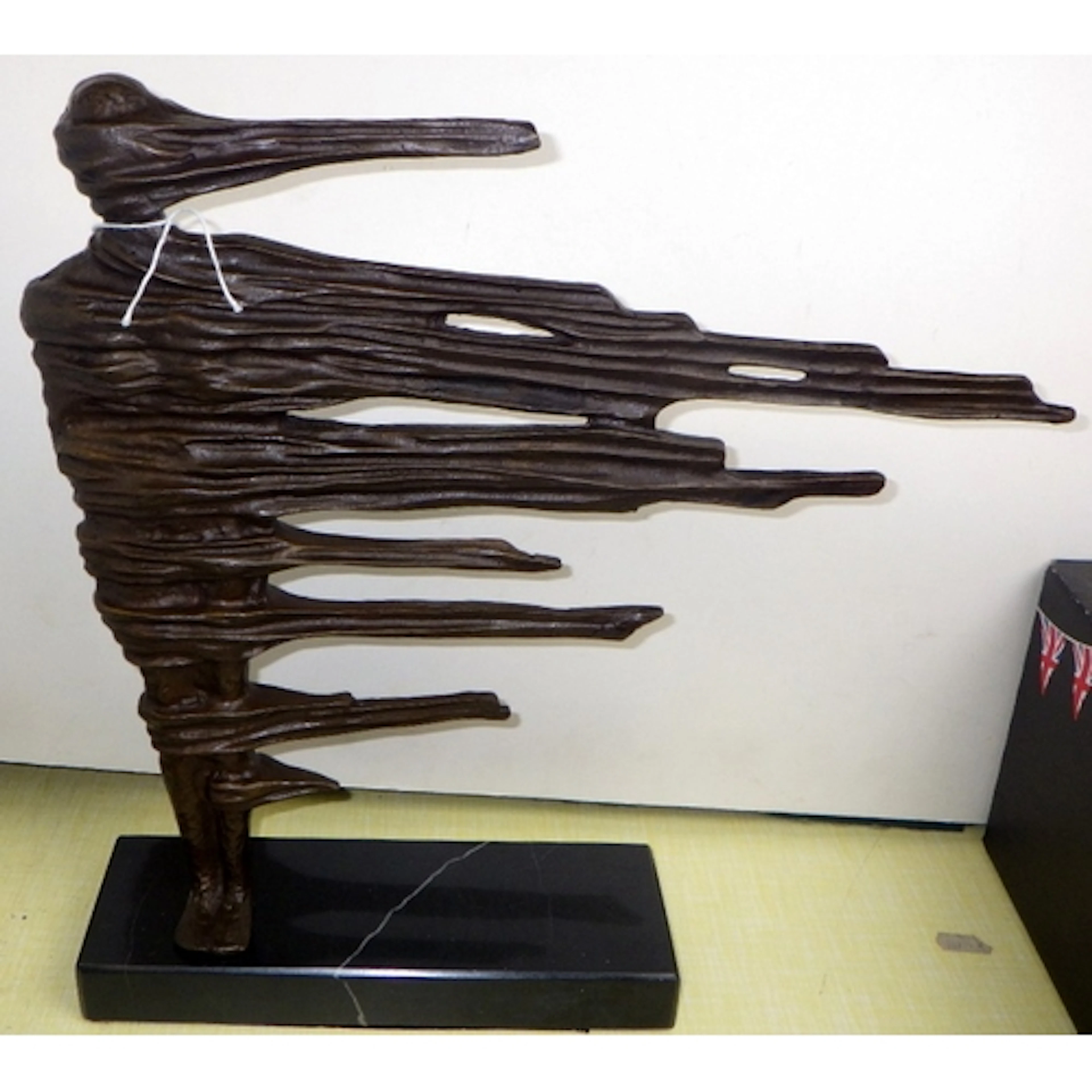A bronze abstract Surrealist figure of a dancer, 40cm tall
