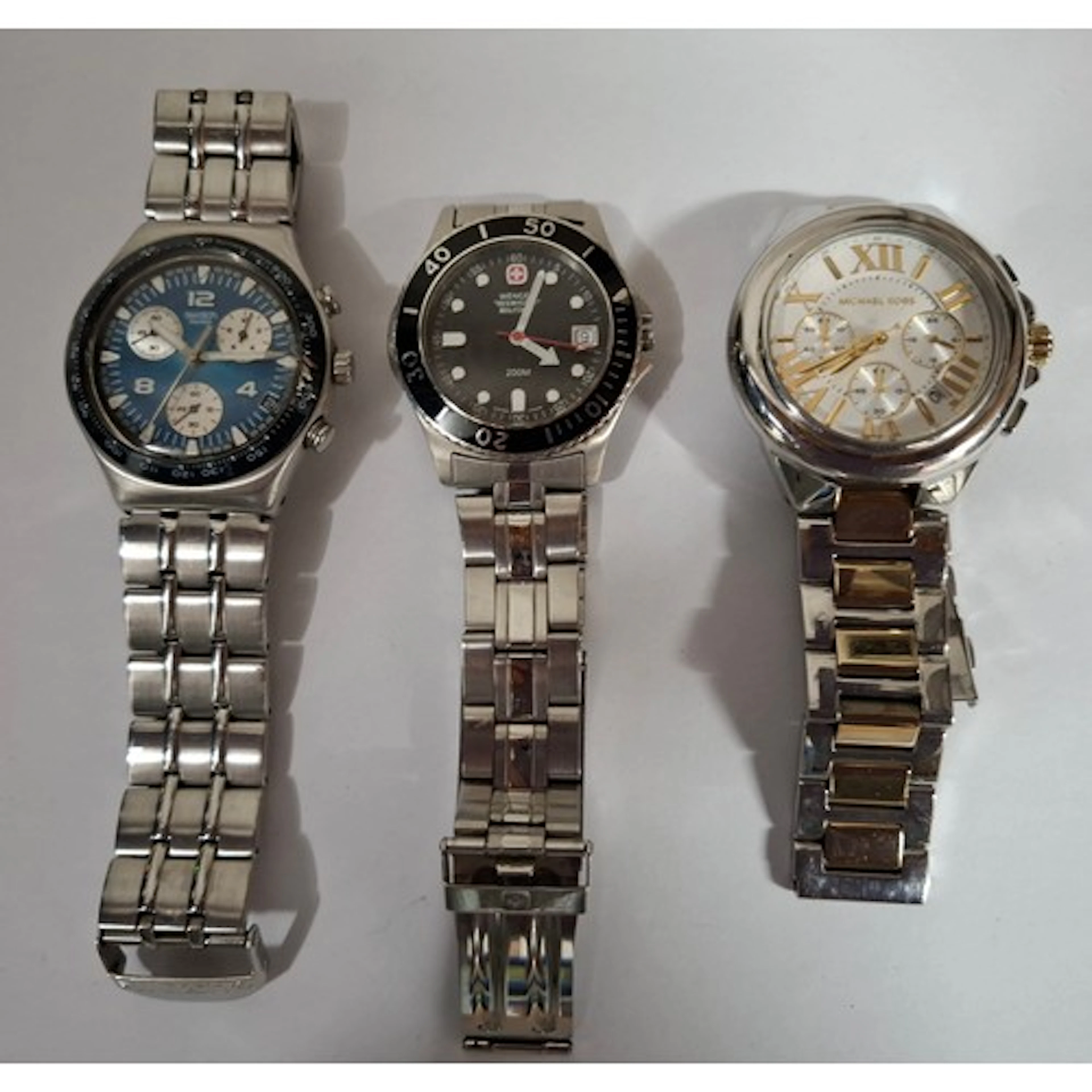 Three watches comprising a Swatch chronograph, a Wengel Swis...