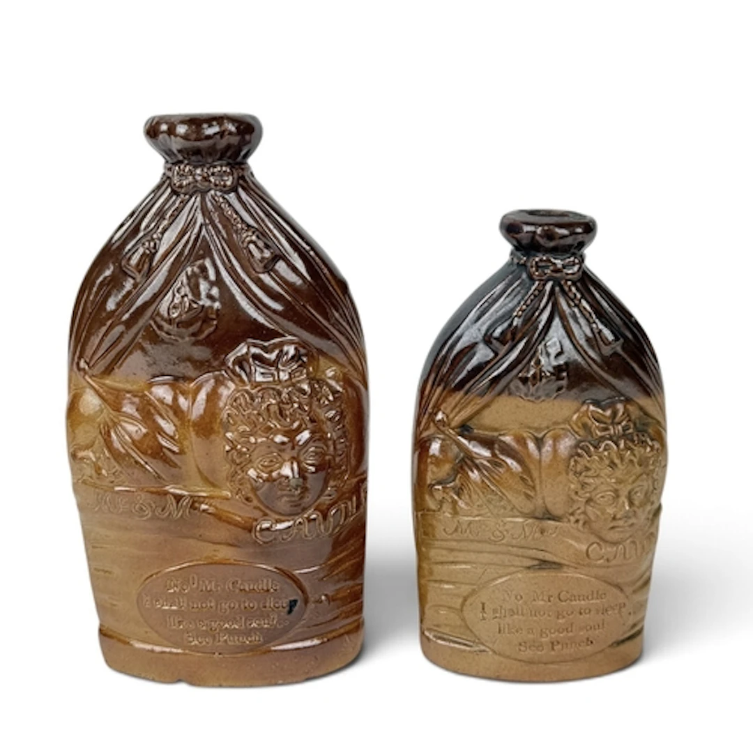 A DOULTON AND WATTS 'MR & MRS CAUDLE' STONEWARE FLASK, C...