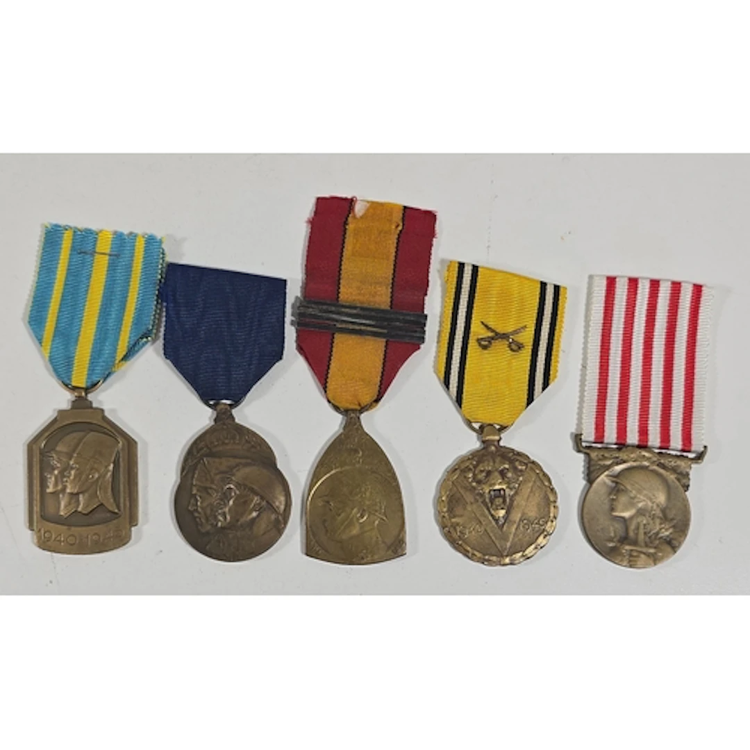 Four Belgian medals: 1914-18 Volunteers Medal; 1914-18 Comme...