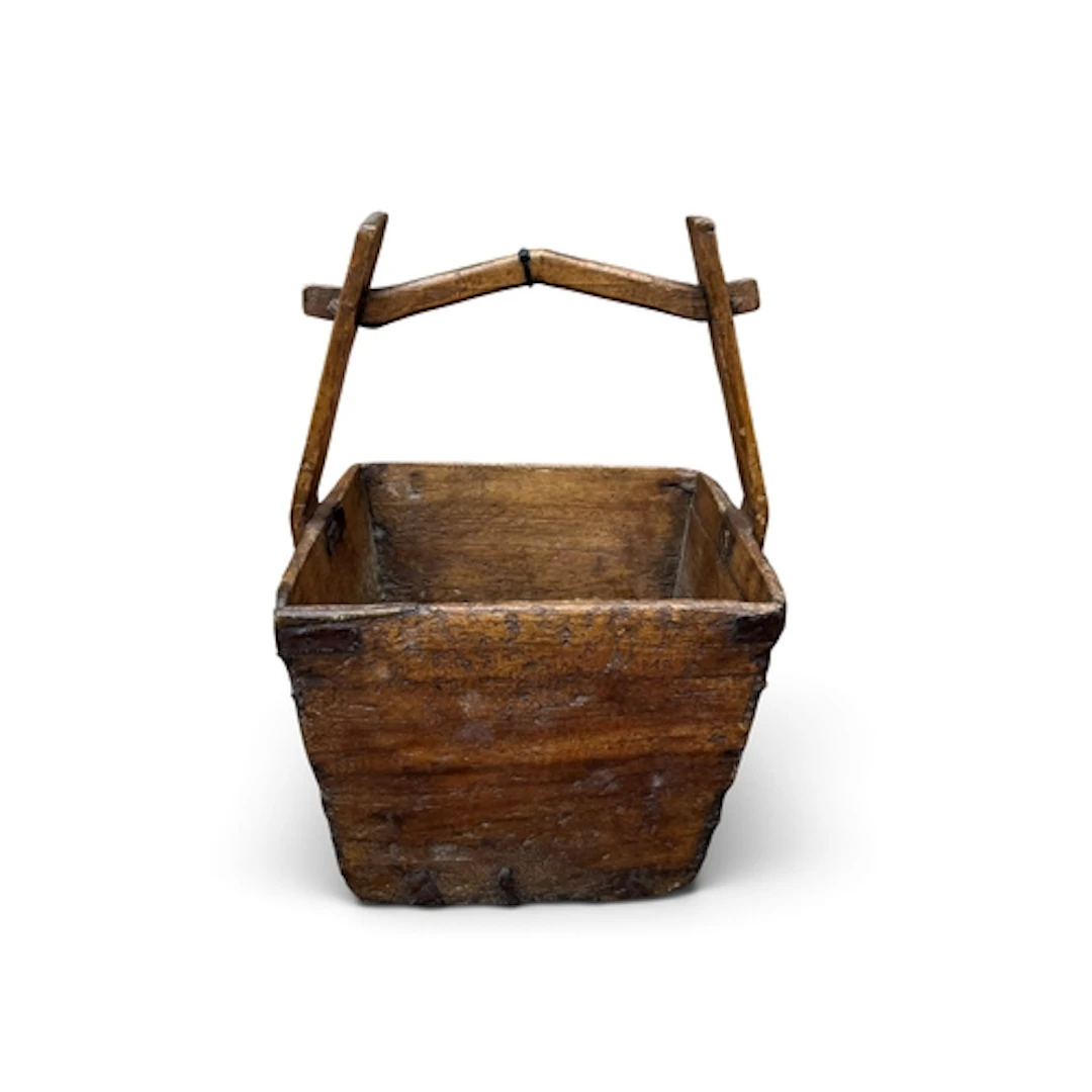 A 17TH/18TH CENTURY OAK FRUIT BASKET With top carrying handl...