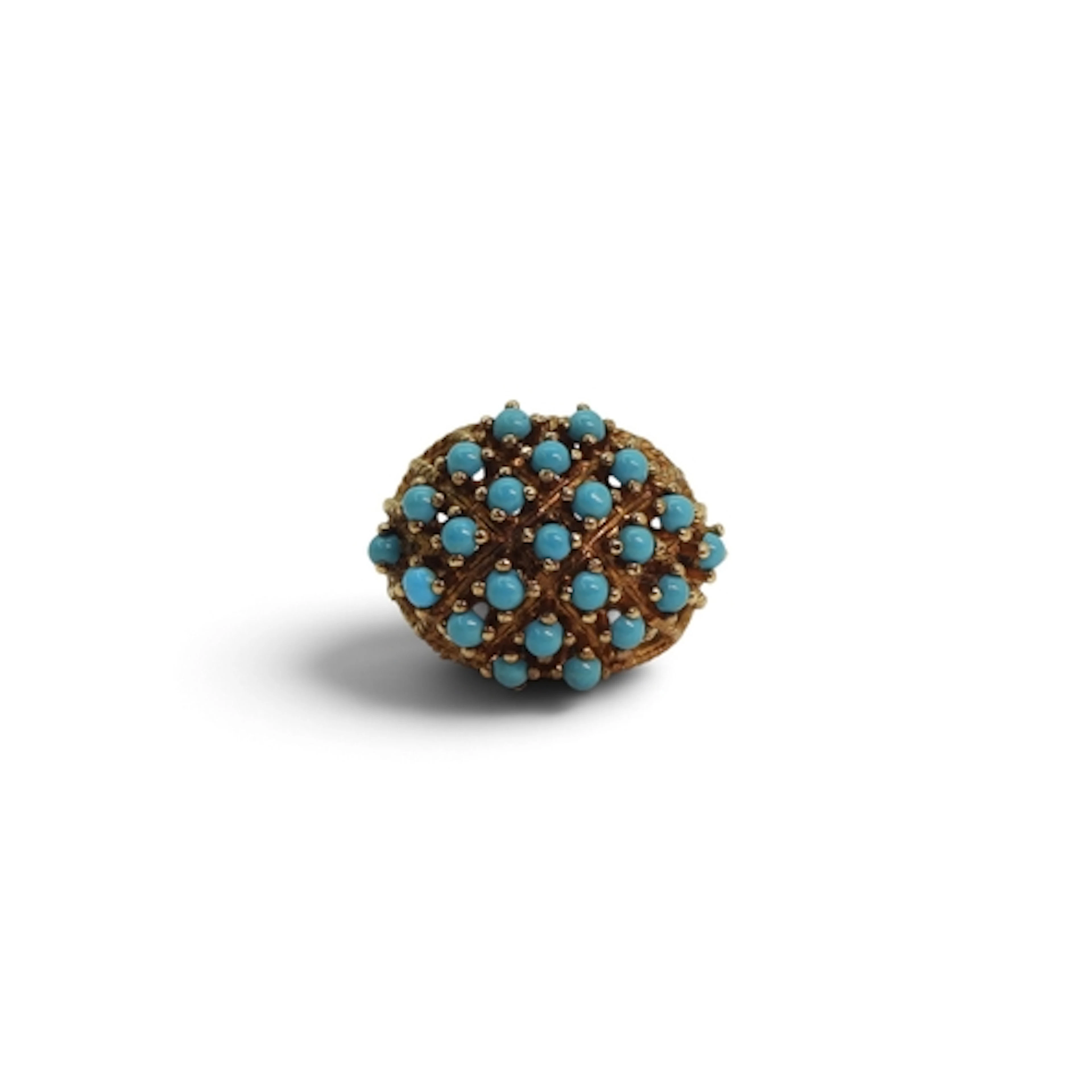 A 9ct gold filigree dome ring set with turquoise, size R, we...