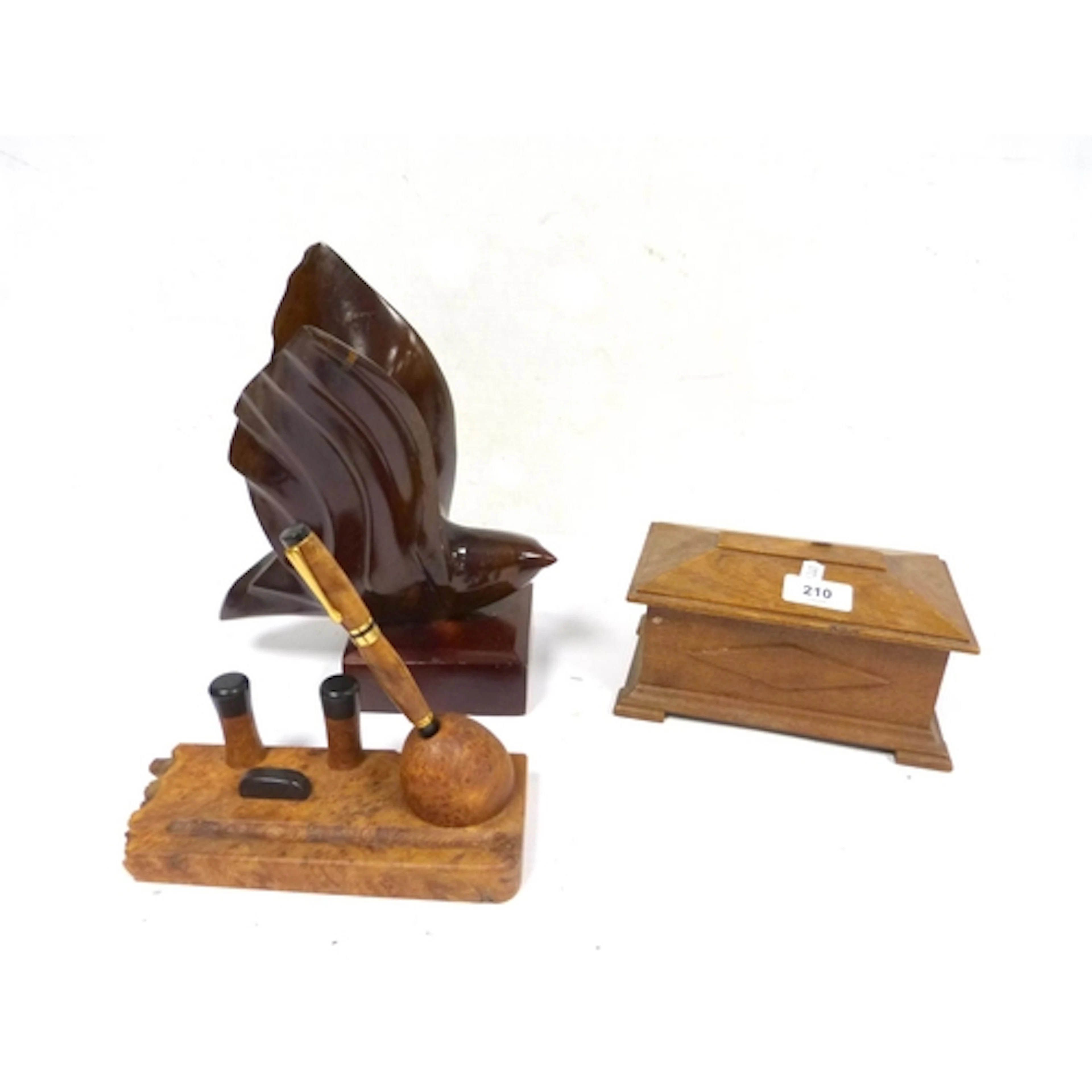 Walnut pen and stand, treen box and bird carved sculpture.